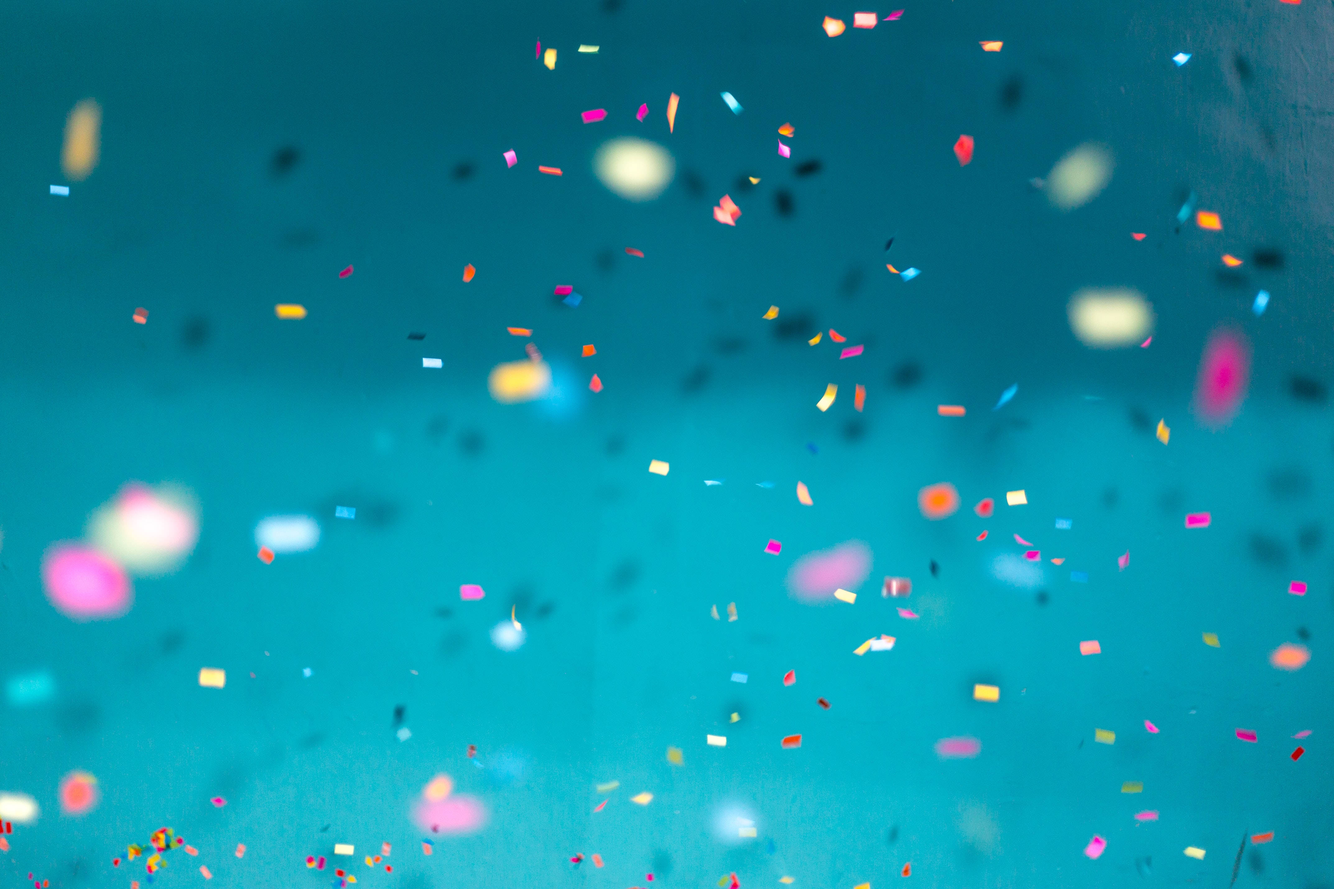 confetti, teal background, festive celebration scene, 4K Desktop Wallpaper