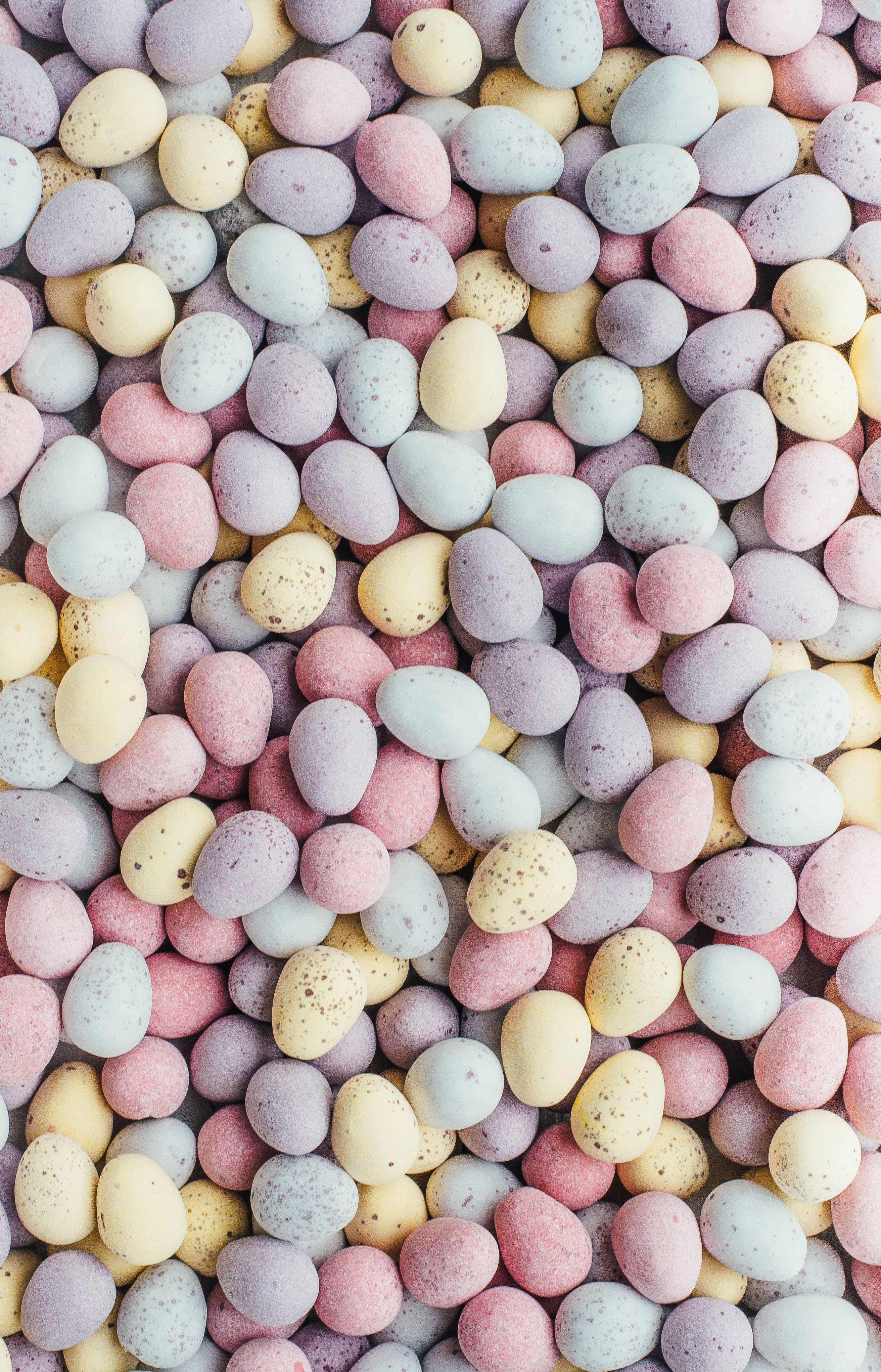 pastel pebbles aesthetic pattern, pastel-colored speckled chocolate eggs, soft pink, 4K Phone Wallpaper