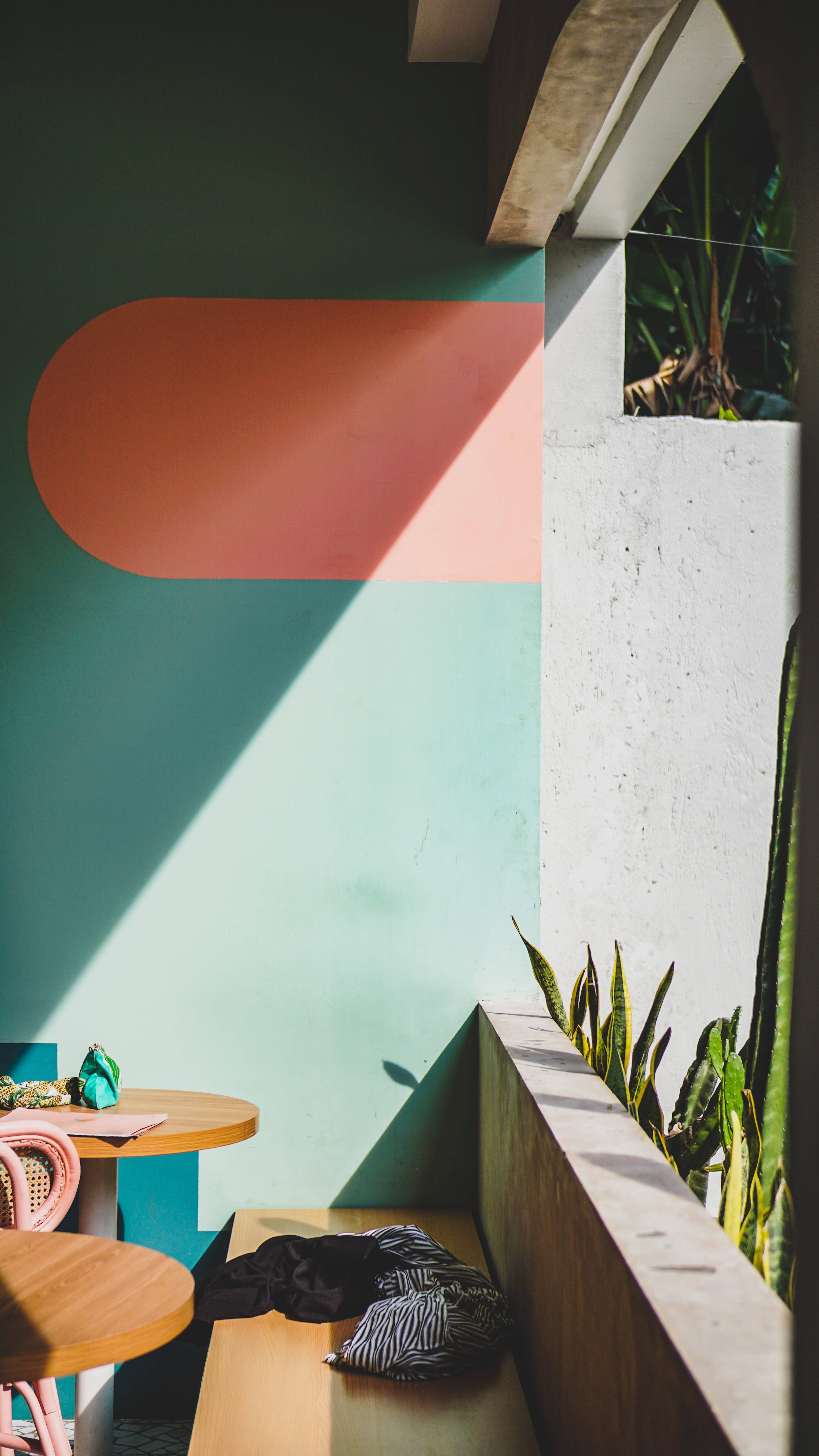 pastel green wall, wooden table, concrete bench, 5K Phone Wallpaper