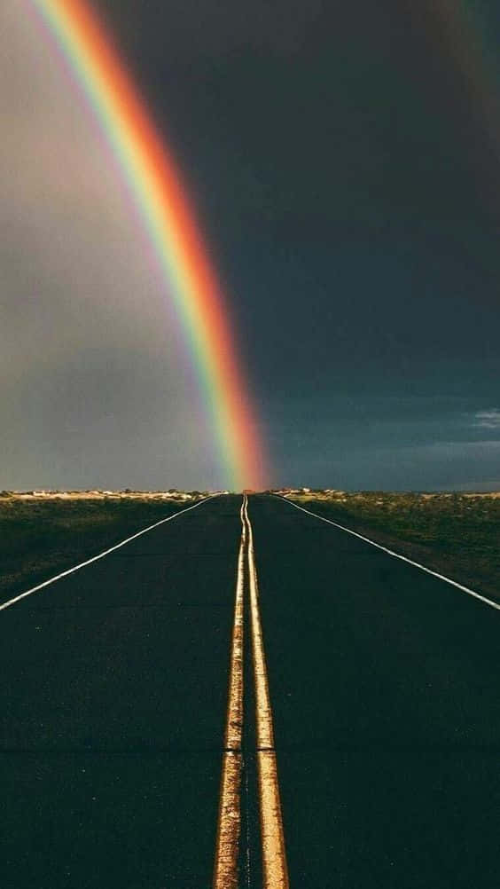 rainbow, long straight road, stormy sky, SD Phone Wallpaper