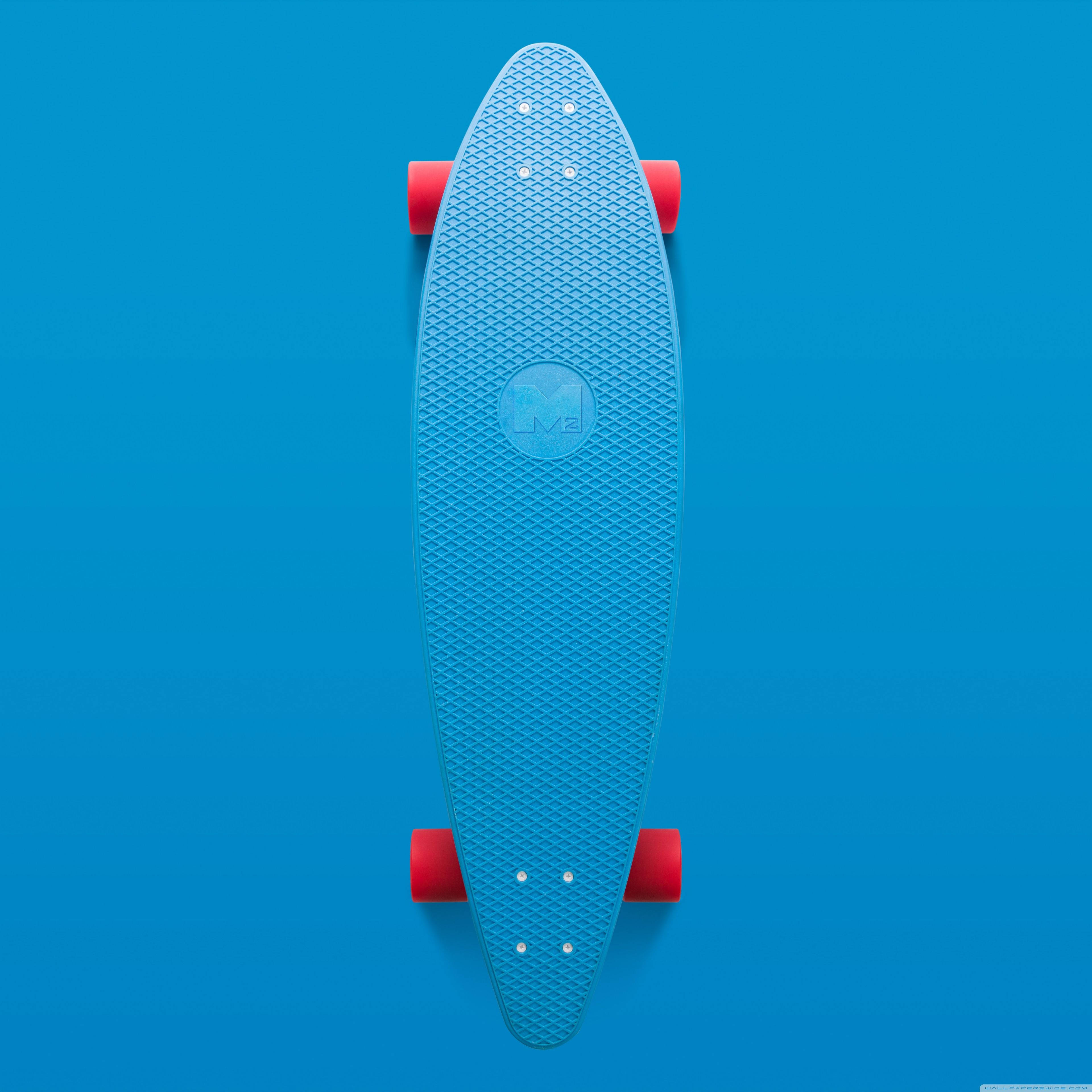 blue longboard skateboard, red wheels, solid blue background, 4K Desktop Wallpaper