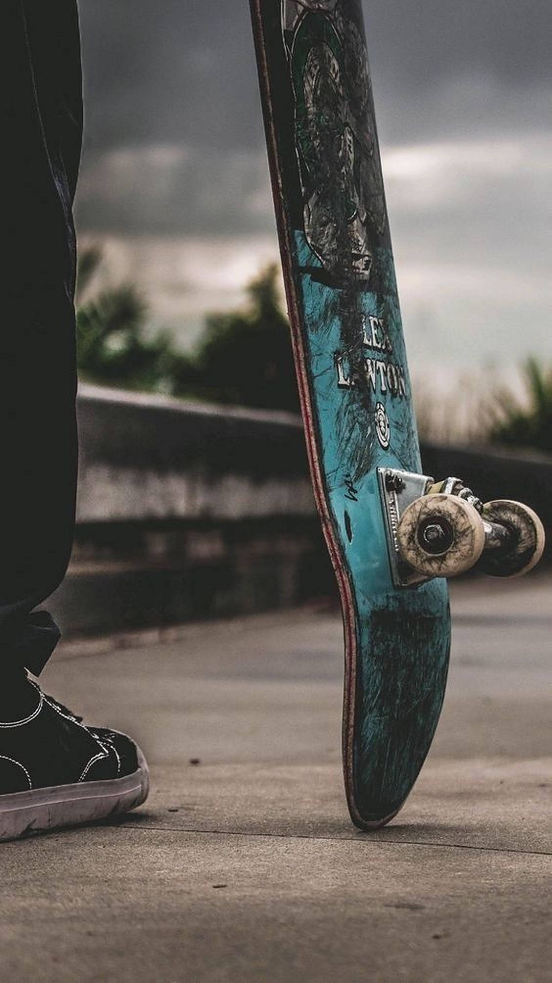 teal skateboard, concrete surface, cloudy sky, Full HD Phone Wallpaper