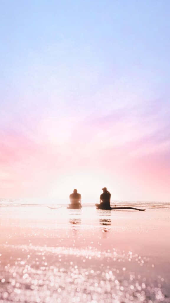 sunset, silhouetted figures, shallow water, SD Phone Wallpaper