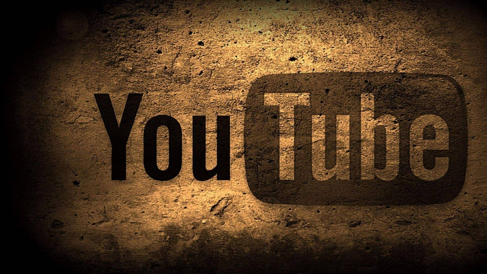 YouTube logo, textured wall, warm spotlighting, Full HD Desktop Wallpaper