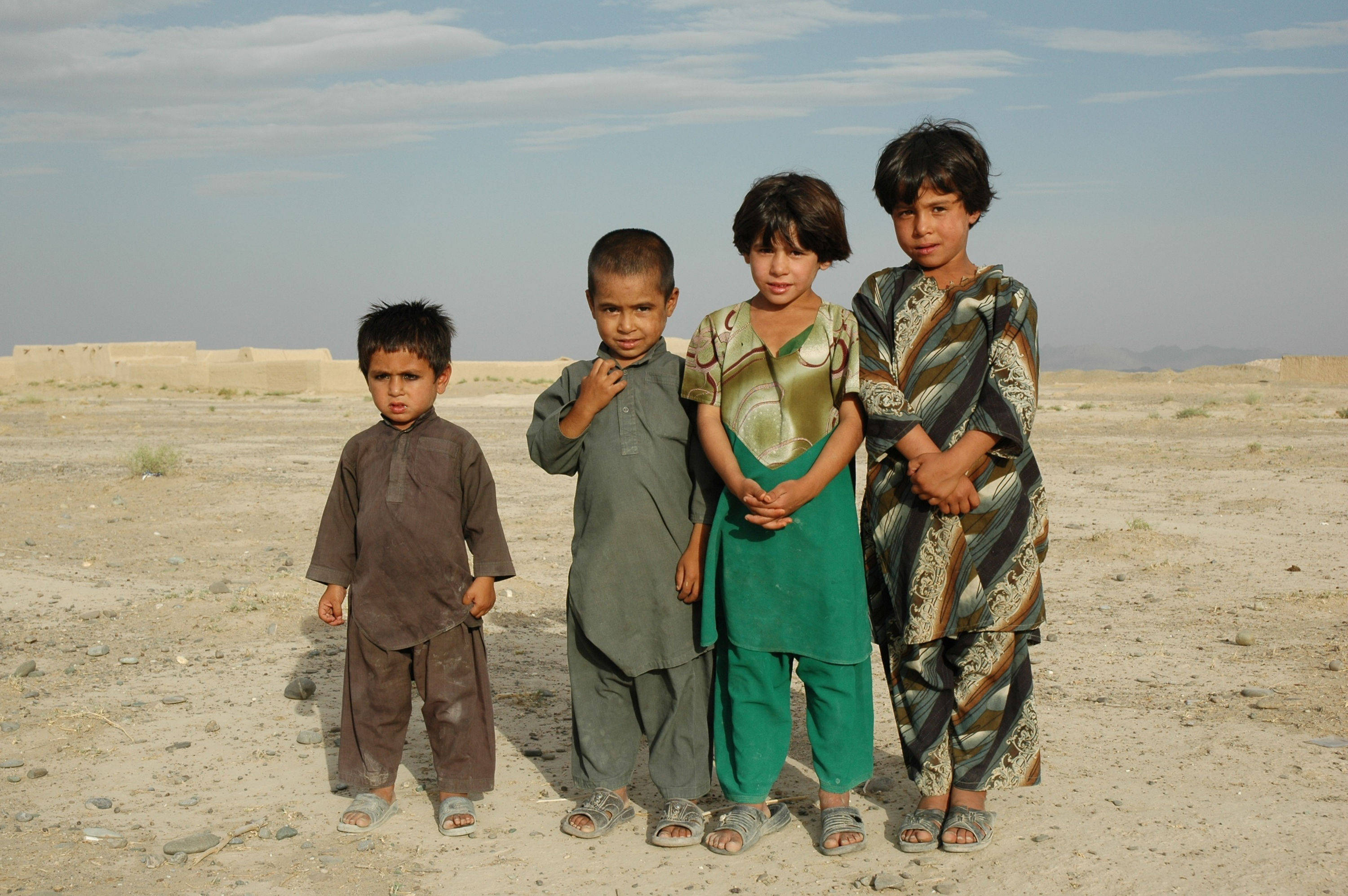 young boys, traditional clothing, dry dusty field, 2K Desktop Wallpaper