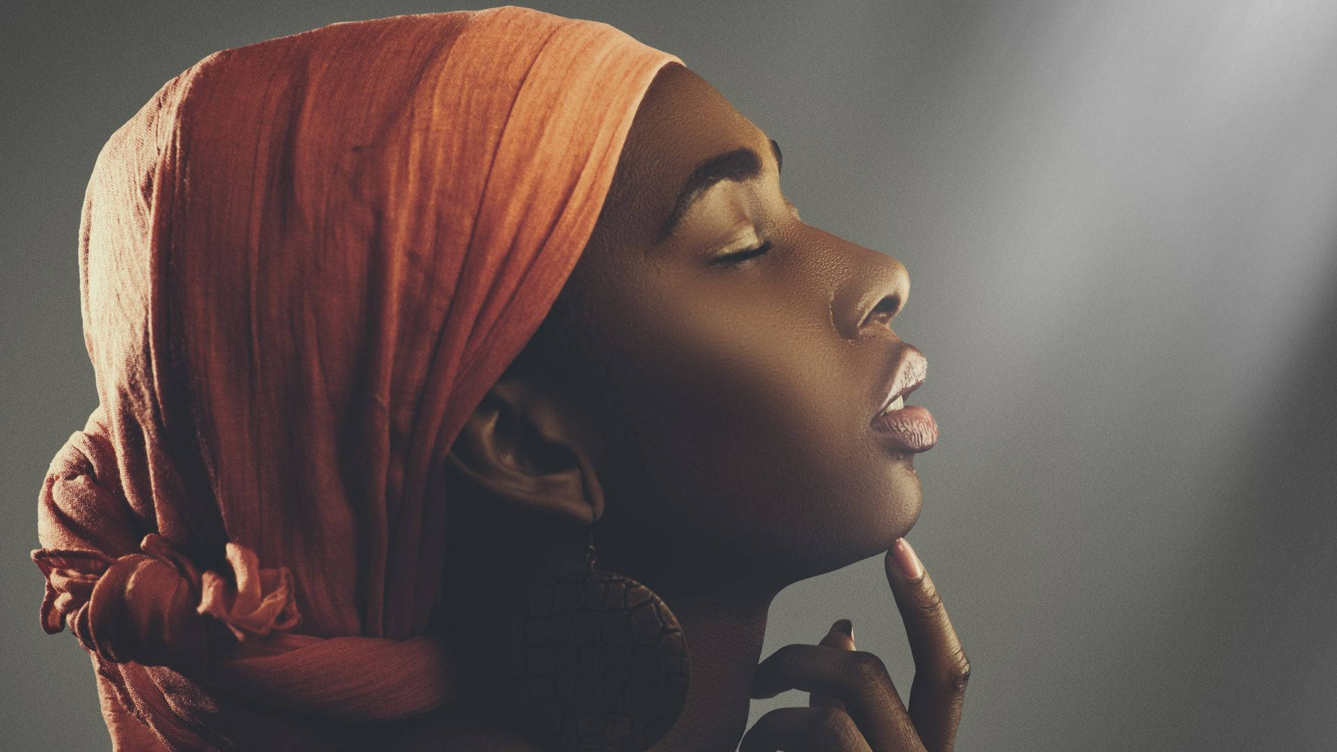 African Woman, rust-colored headscarf, soft light, Full HD Desktop Wallpaper