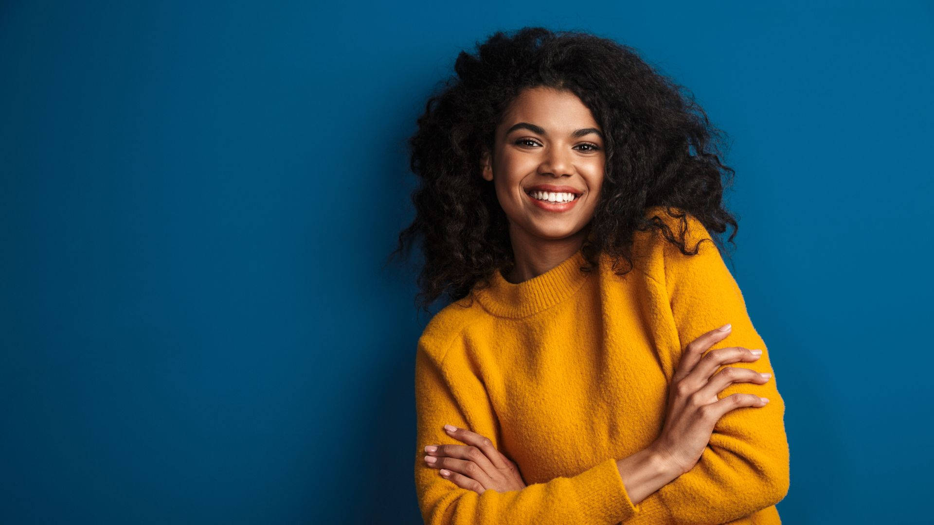 African Woman, mustard sweater, solid blue background, Full HD Desktop Wallpaper