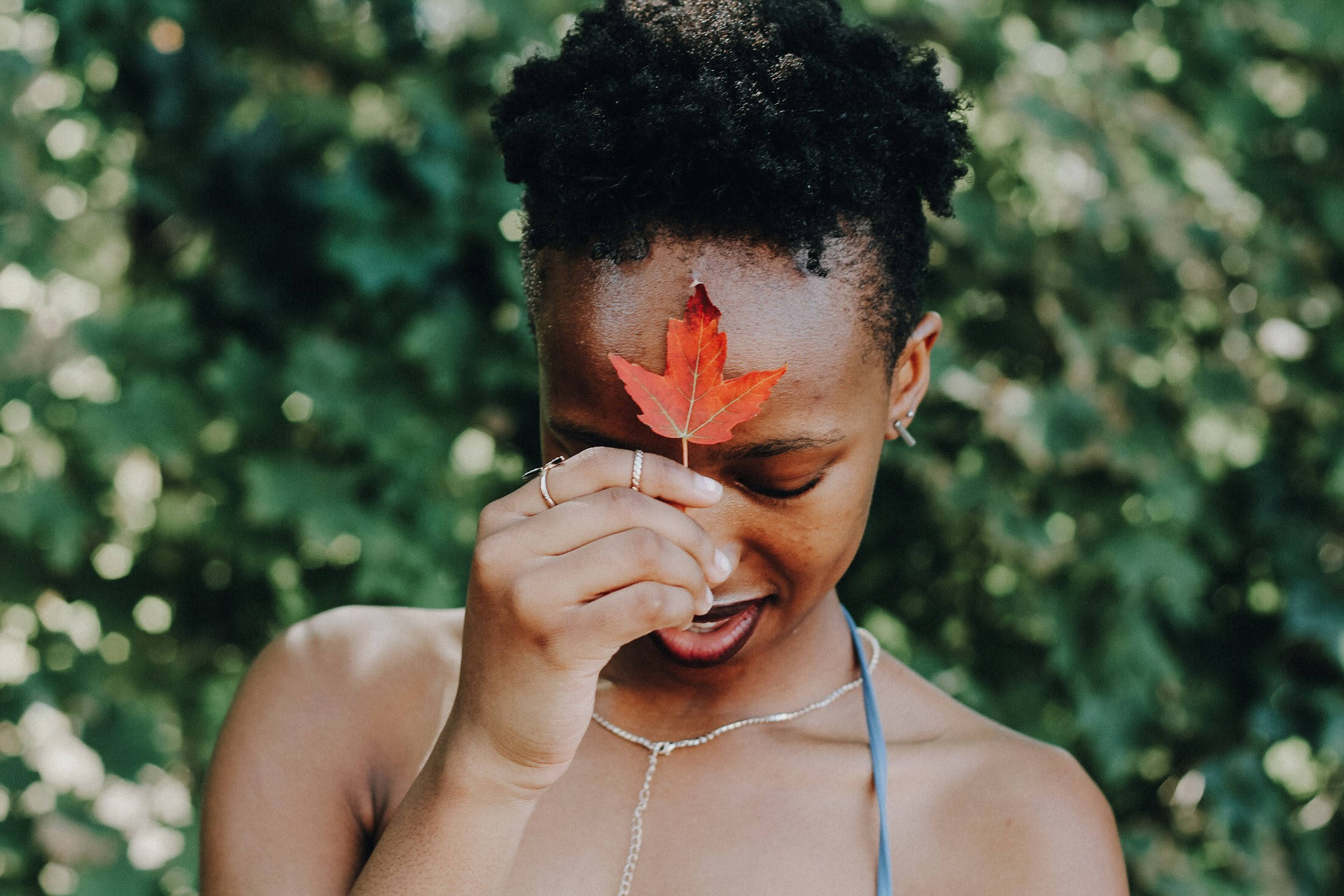 African girl, maple leaf, vibrant red, Full HD Desktop Wallpaper