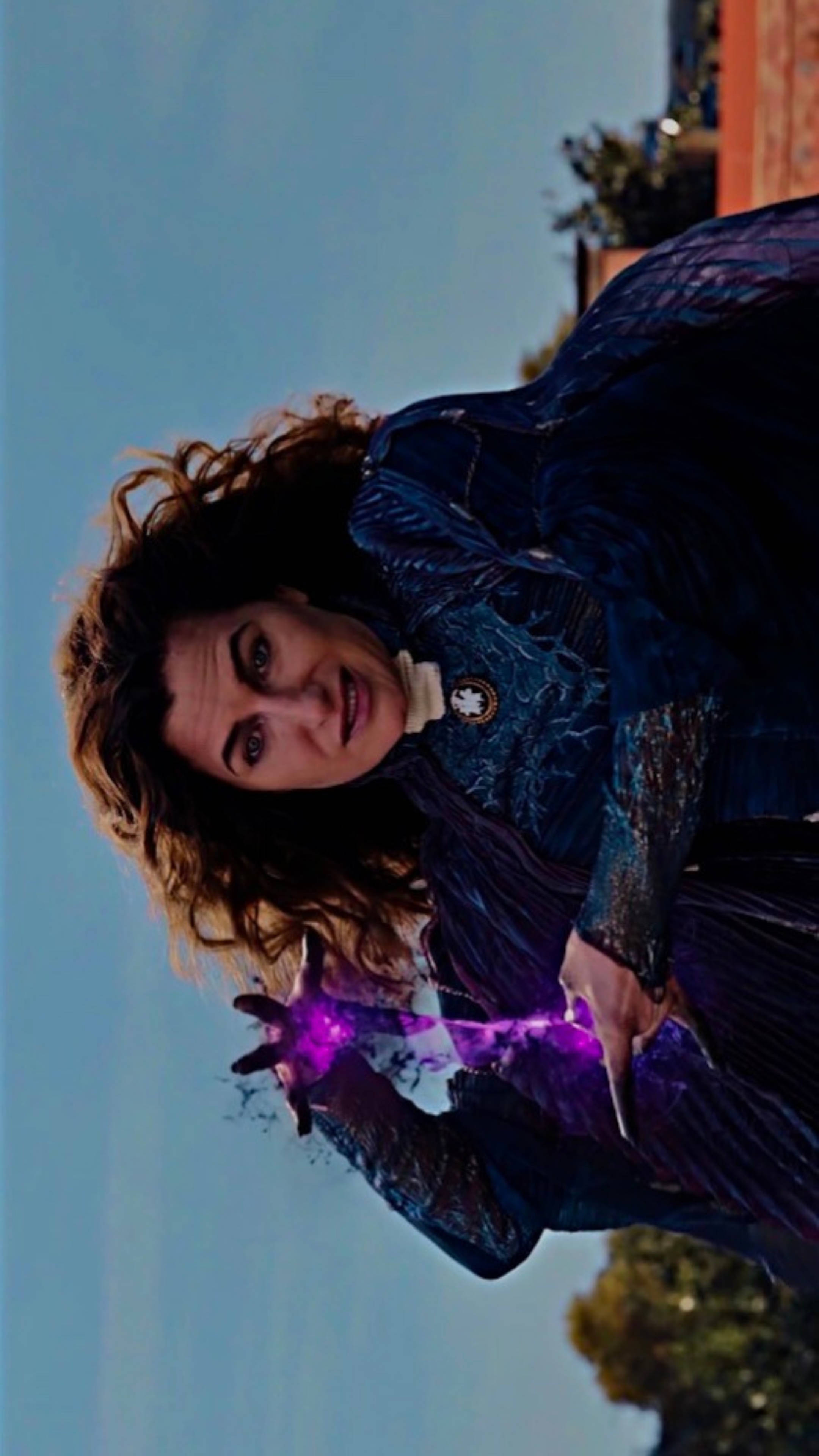 Agatha Harkness, dark blue textured outfit, vibrant purple magical energy, 4K Phone Wallpaper
