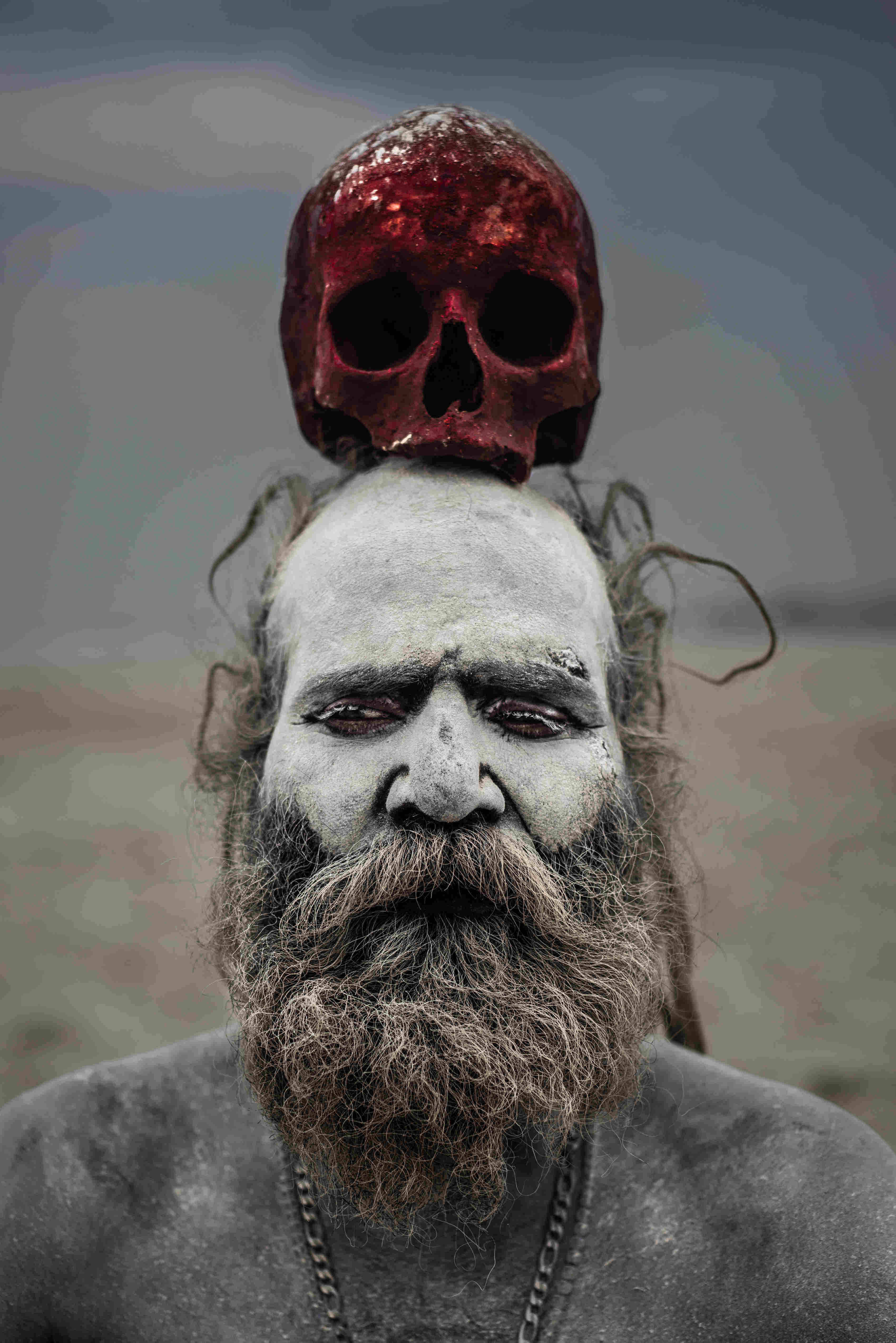 Aghori, bloody skull, white-painted face, 4K Phone Wallpaper