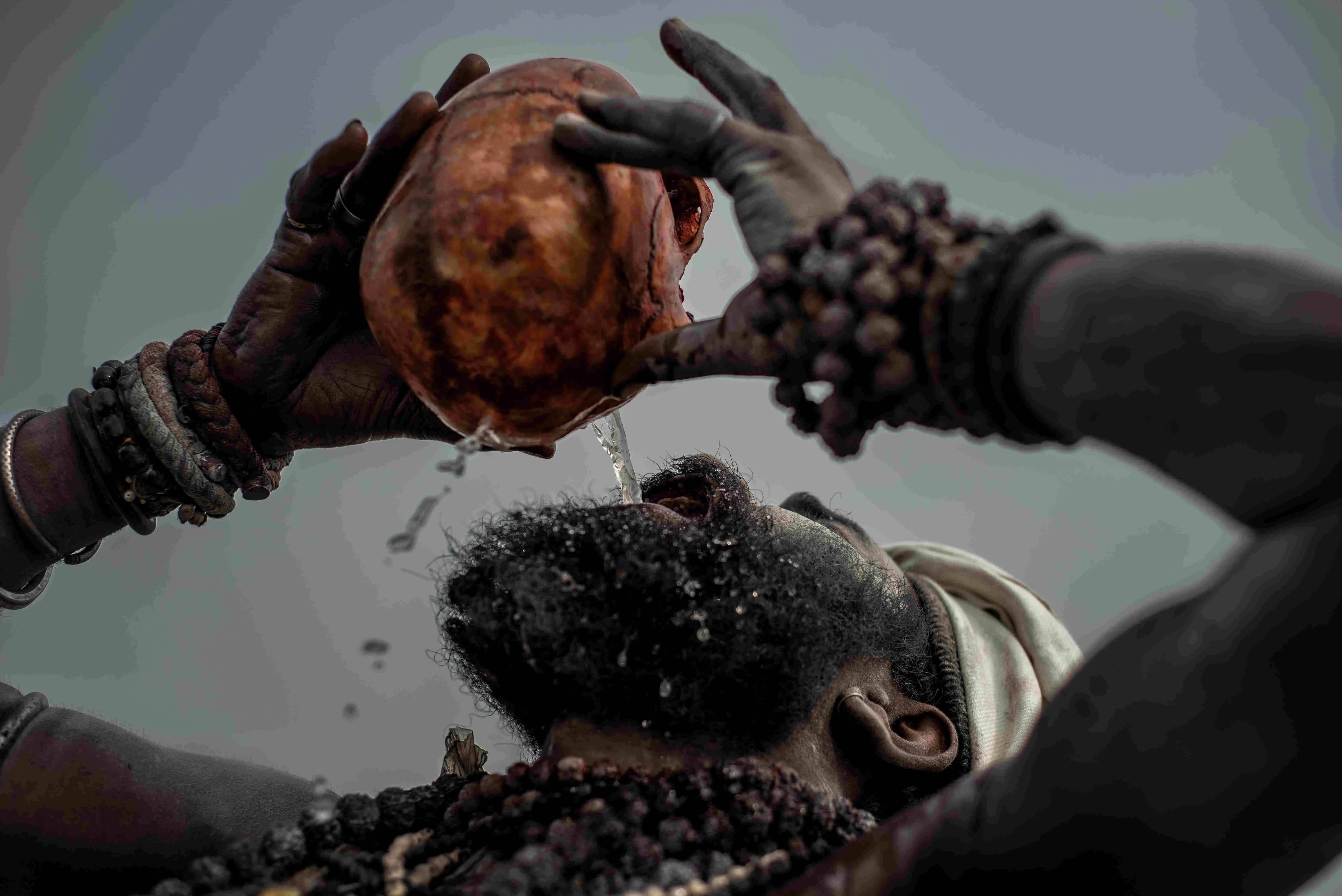 Aghori, cracked coconut, beaded necklaces, 5K Desktop Wallpaper