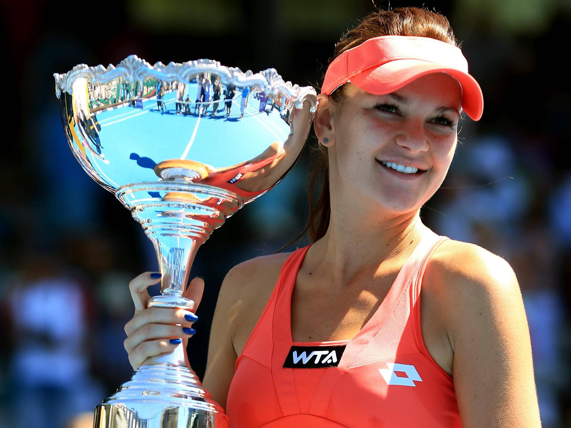 Agnieszka Radwanska, orange gear, gleaming silver trophy, Full HD Desktop Wallpaper