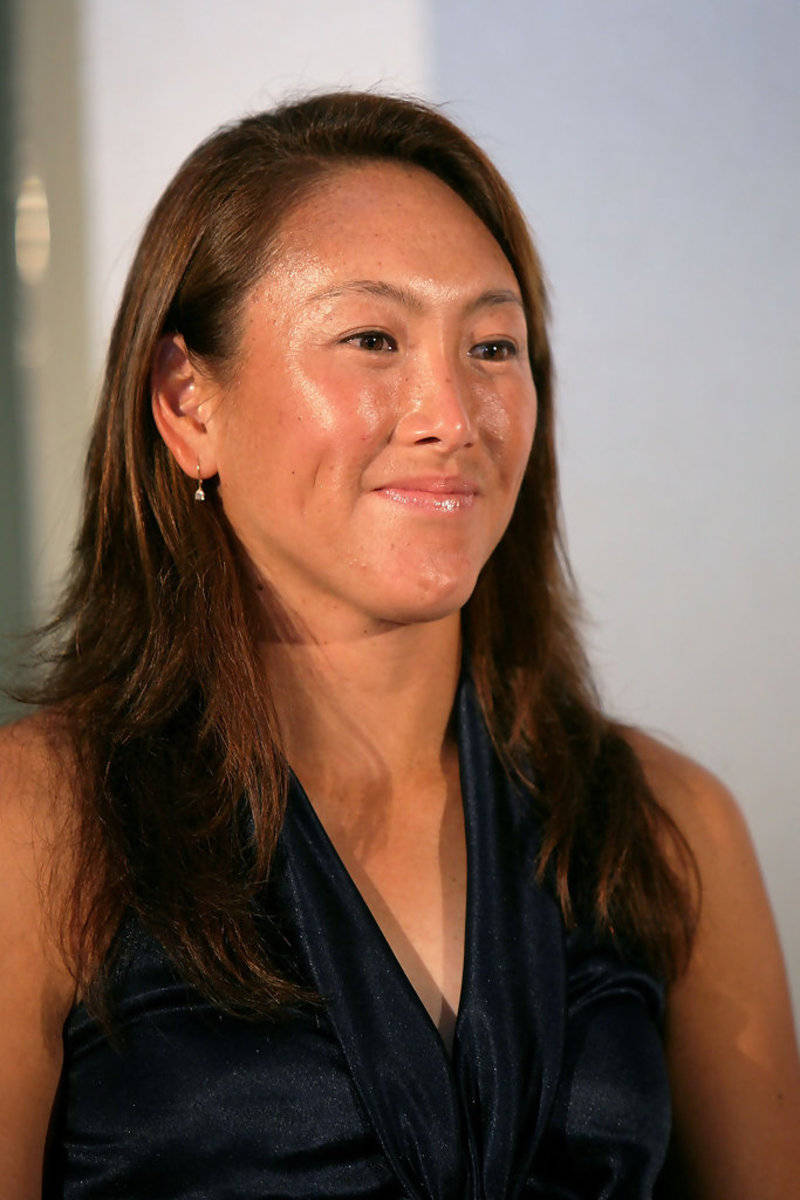 AI Sugiyama, long brown hair, dark blue satin top, SD Phone Wallpaper