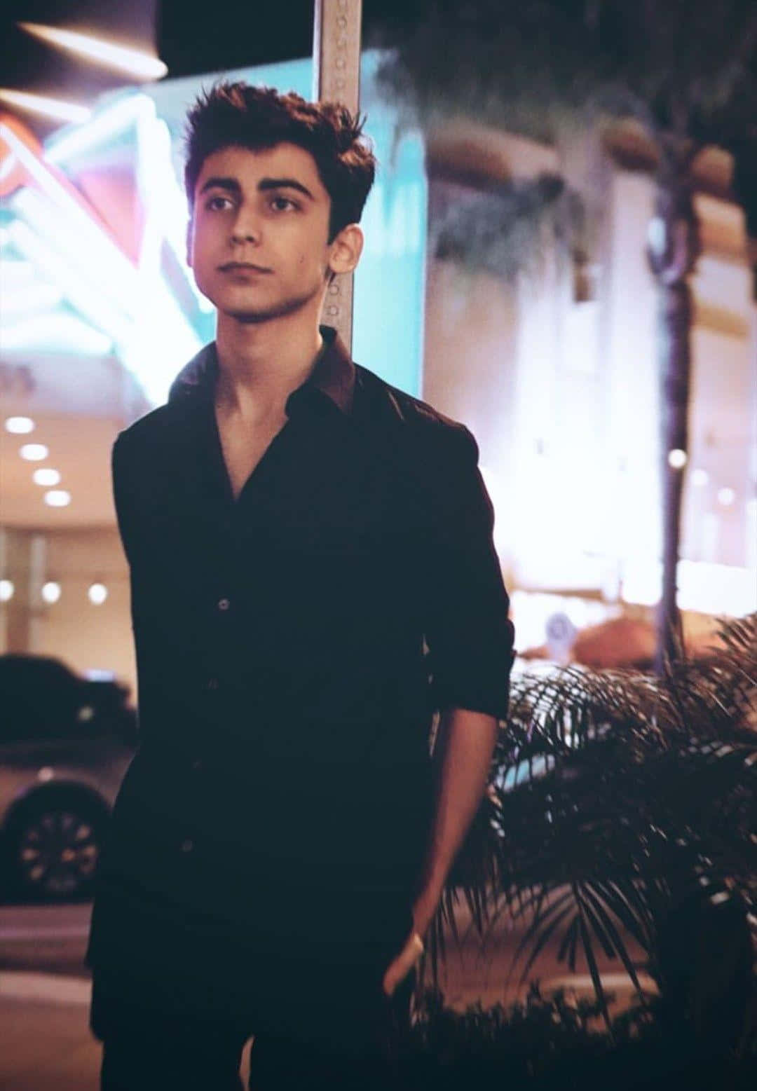 Aidan Gallagher, neon-lit city street, night, HD Phone Wallpaper