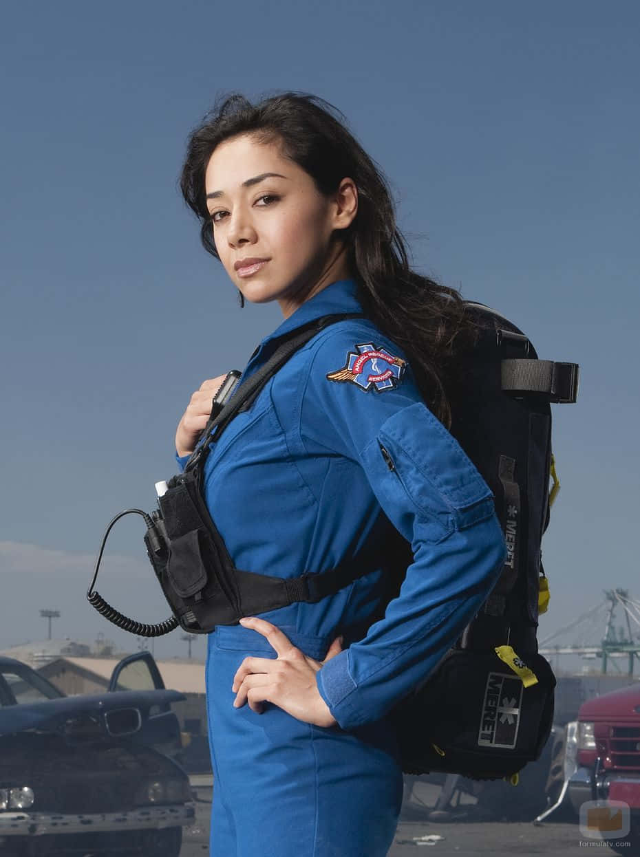 Aimee Garcia, blue flight suit, black backpack, SD Phone Wallpaper