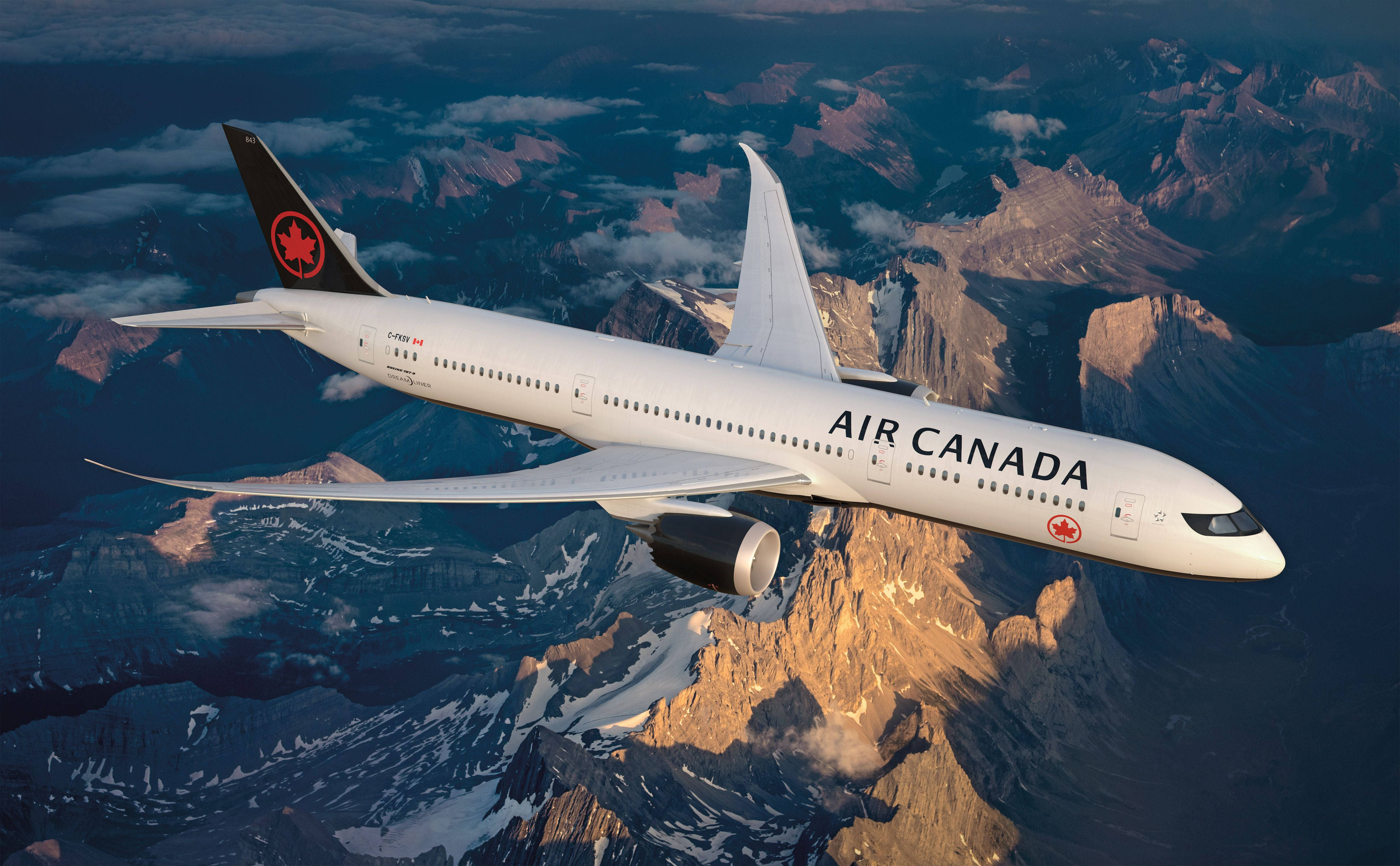 Air Canada, snow-capped mountains, golden sunrise light, 4K Desktop Wallpaper