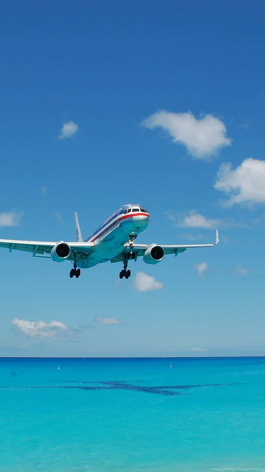 commercial airplane, turquoise ocean waters, clear blue sky, HD Phone Wallpaper