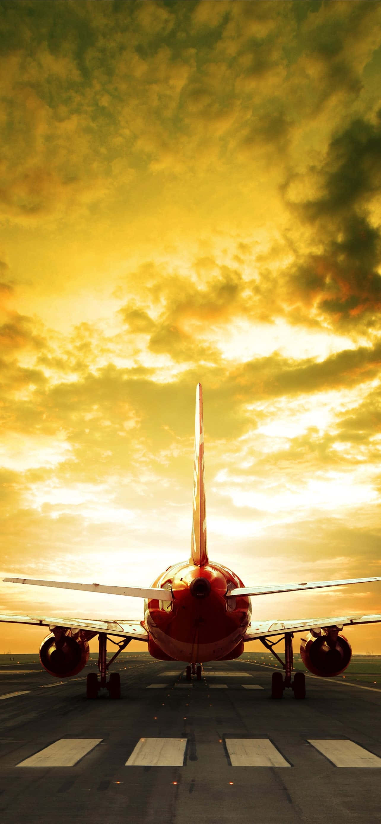 red airplane, runway, dramatic golden sunset sky, 2K Phone Wallpaper
