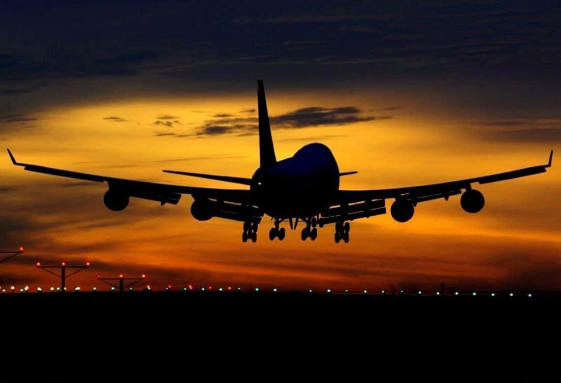 747 airplane, fiery orange and yellow sunset sky, silhouette, SD Desktop Wallpaper