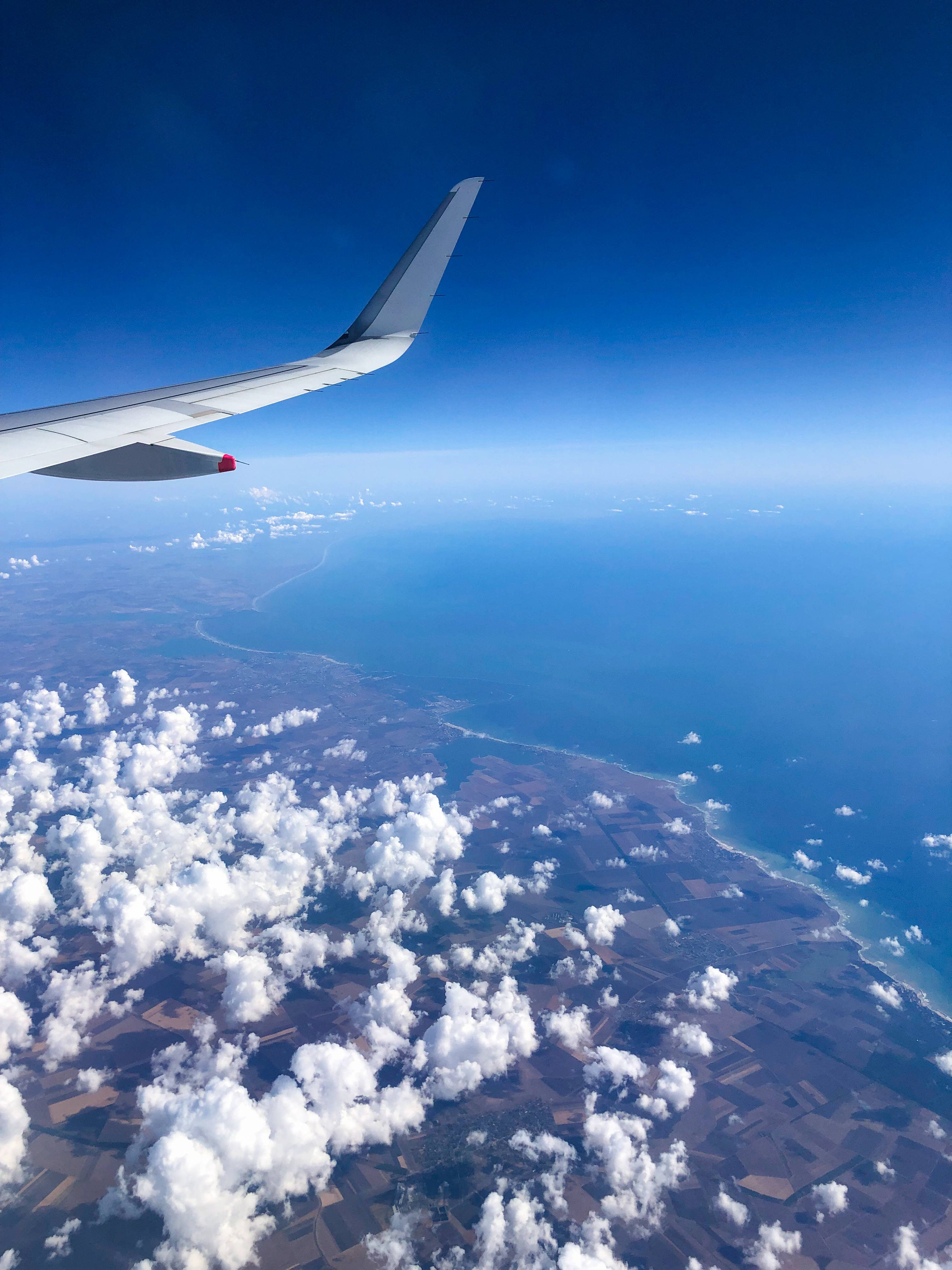 airplane, wing, fluffy clouds, 4K Phone Wallpaper