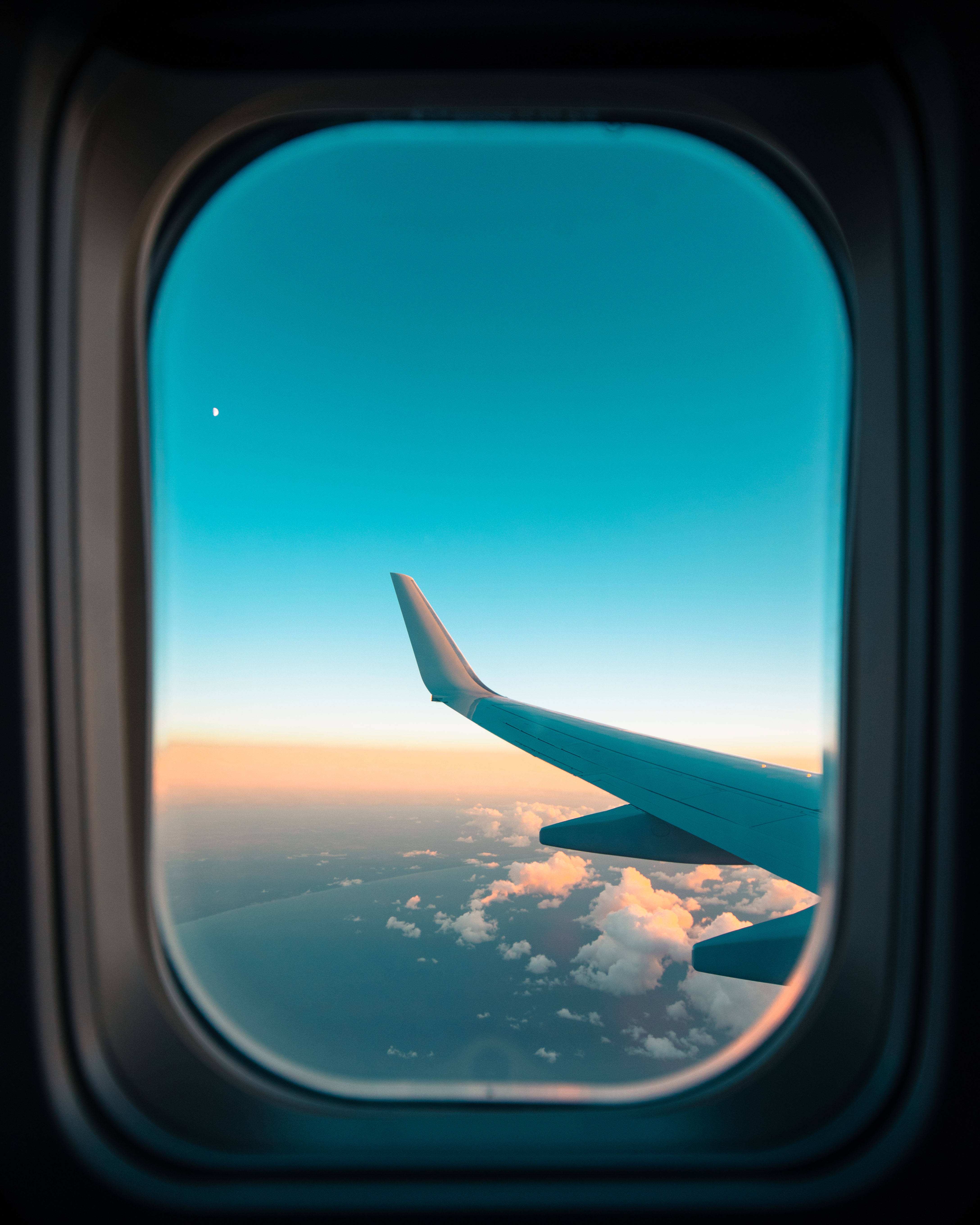 airplane window, sunset, glowing clouds, 5K Phone Wallpaper
