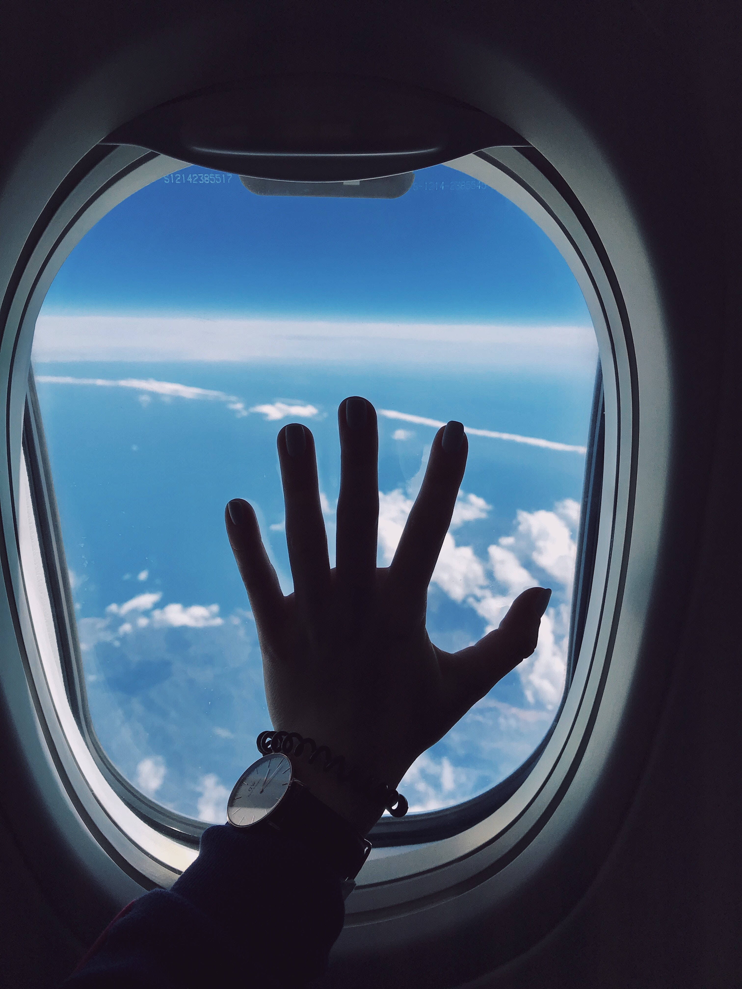 airplane window, blue sky, fluffy white clouds, 4K Phone Wallpaper