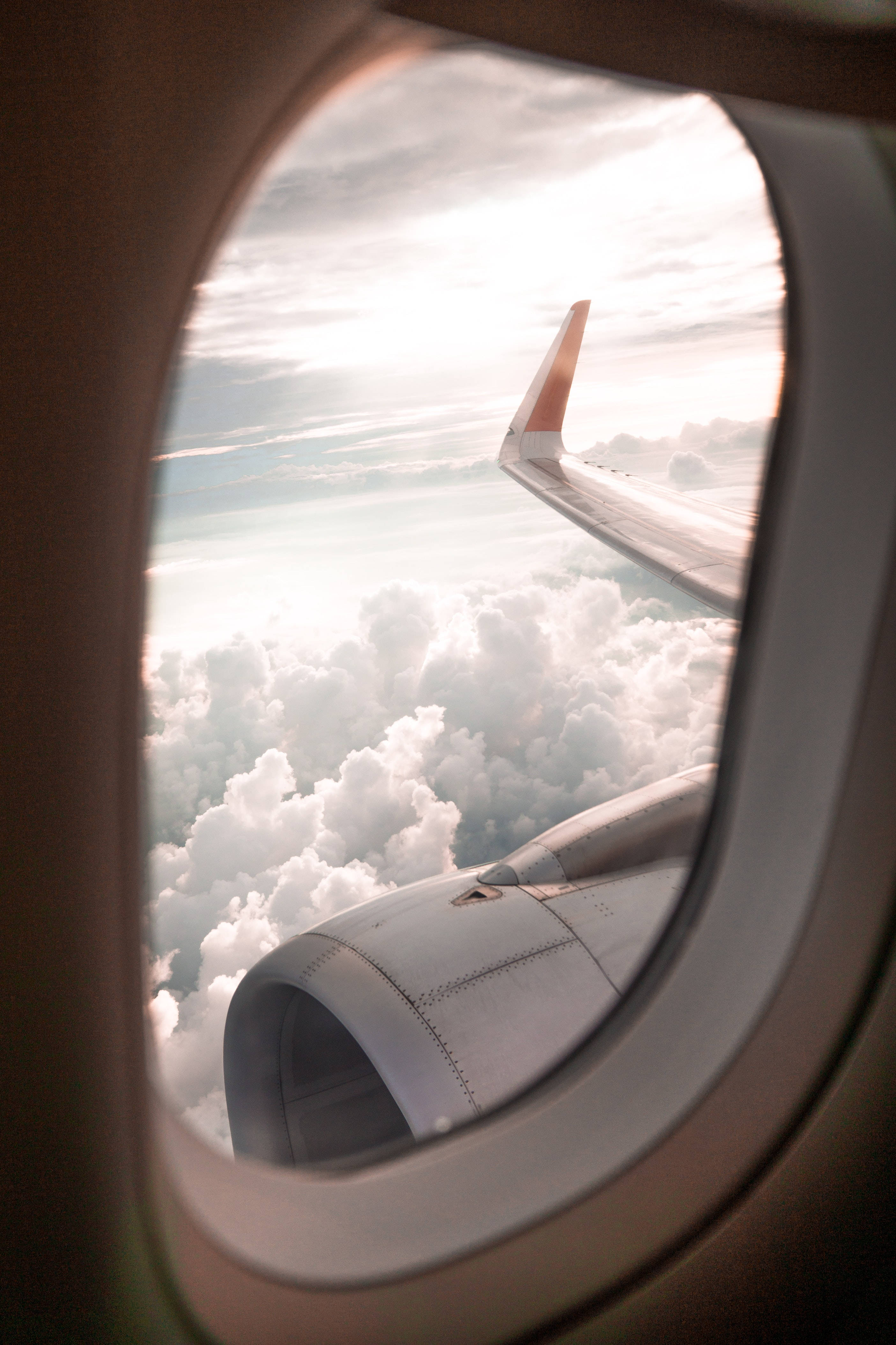 Airplane Window, wing engine, fluffy clouds, 4K Phone Wallpaper