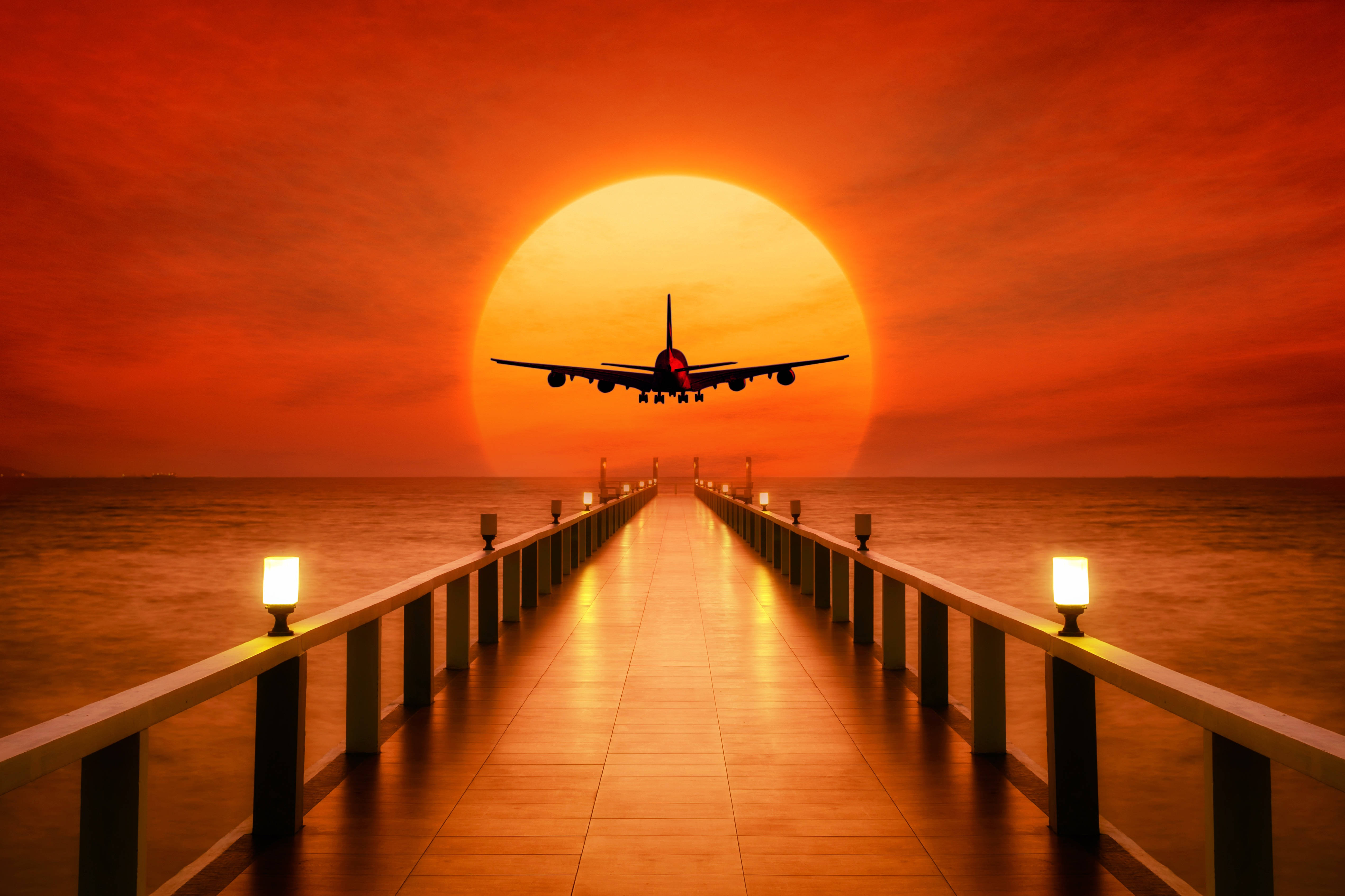 airplane, glowing orange sunset, illuminated pier, 4K Desktop Wallpaper