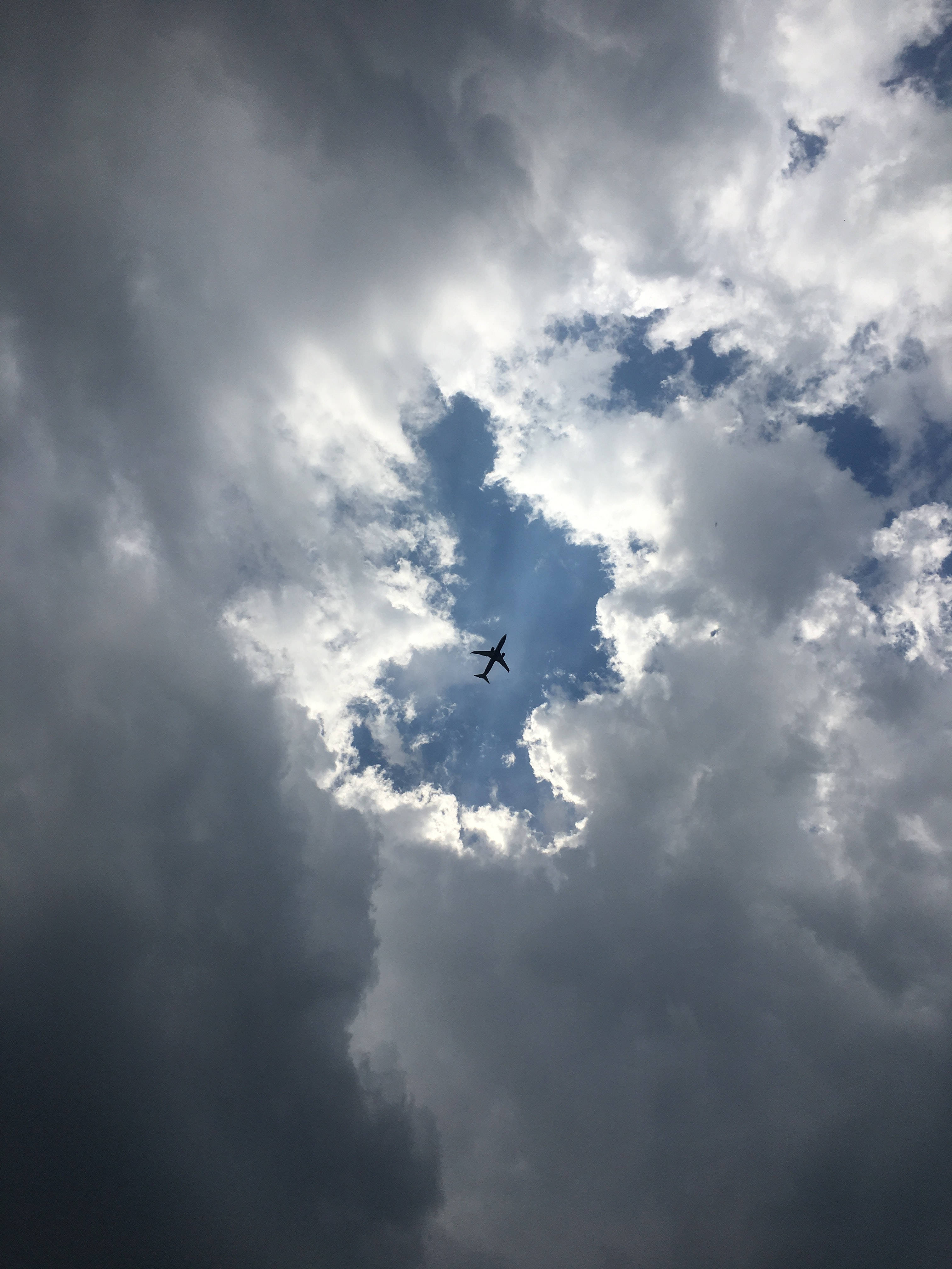 airplane, clouds, sunlit clouds, 4K Phone Wallpaper