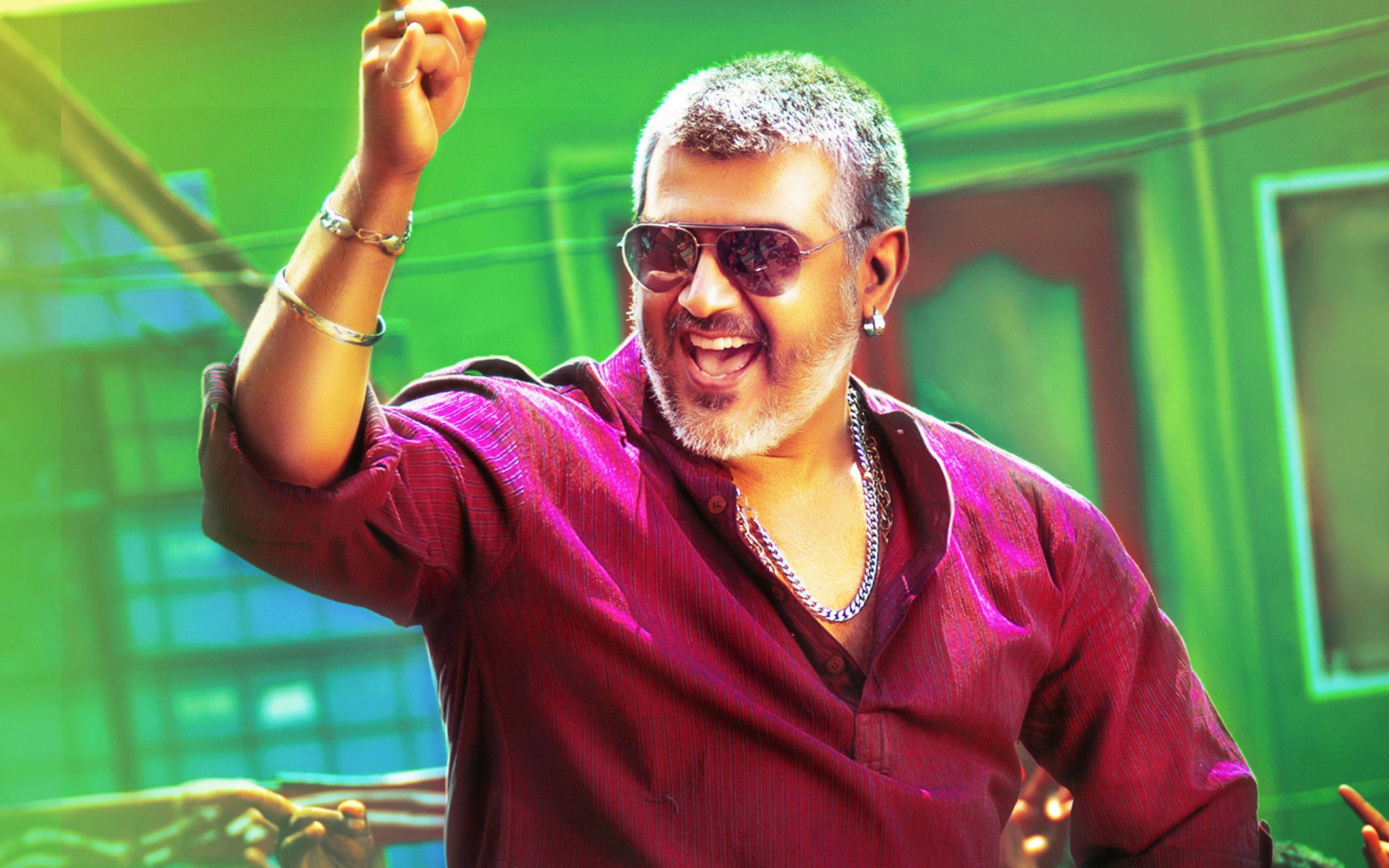 Ajith, dancing, vibrant green-lit room, 2K Desktop Wallpaper