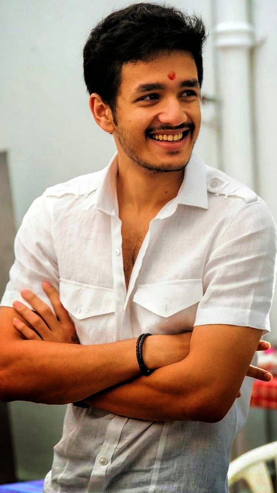 Akhil Akkineni, red bindi, white shirt, HD Phone Wallpaper
