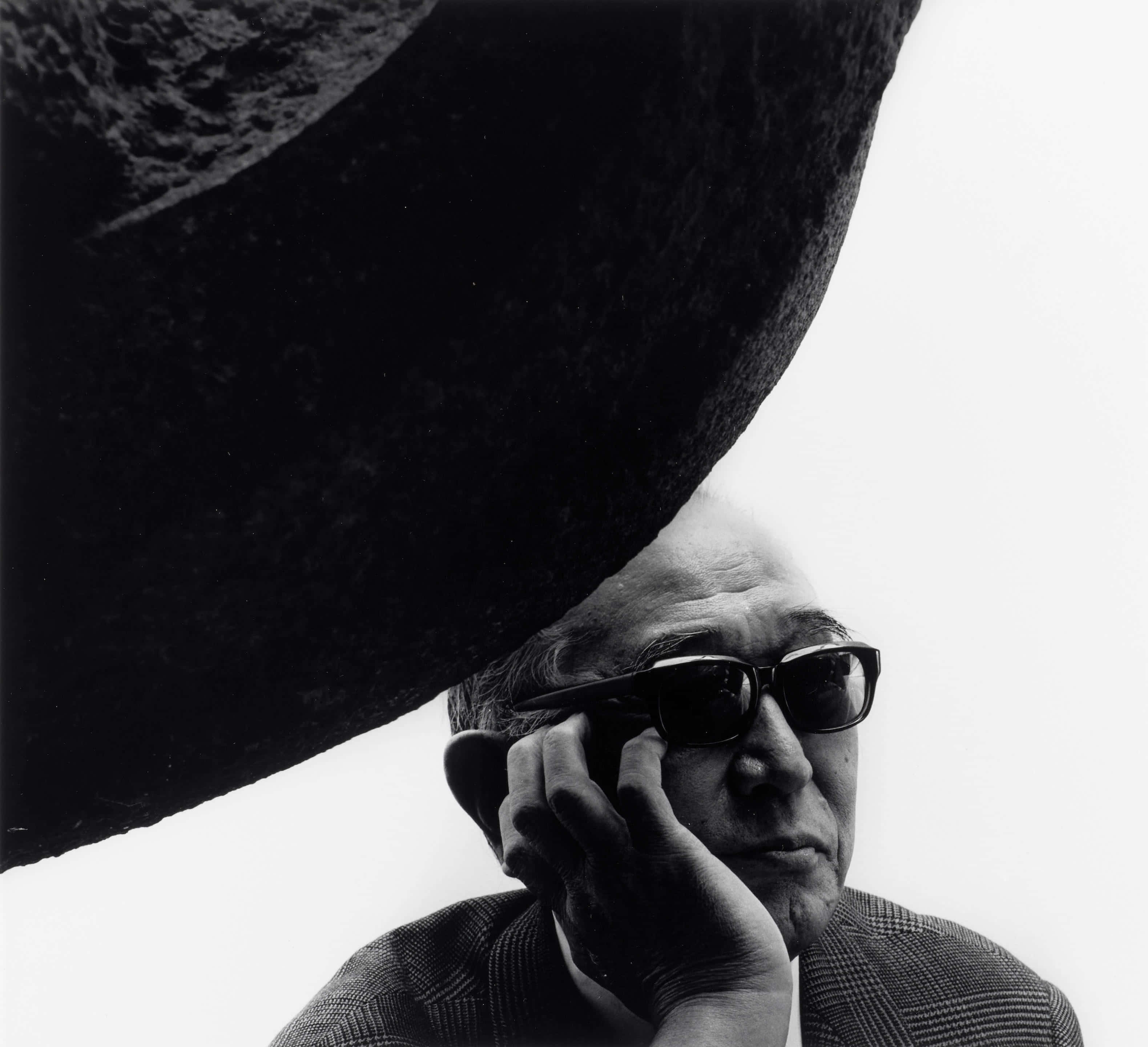 Akira Kurosawa, black and white portrait, stark white background, 2K Desktop Wallpaper