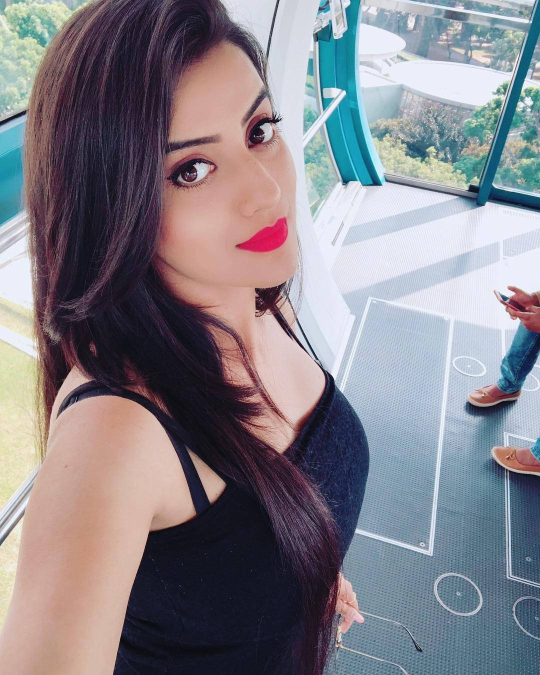 Akshara Singh, glass-enclosed observation deck, long dark hair, HD Phone Wallpaper