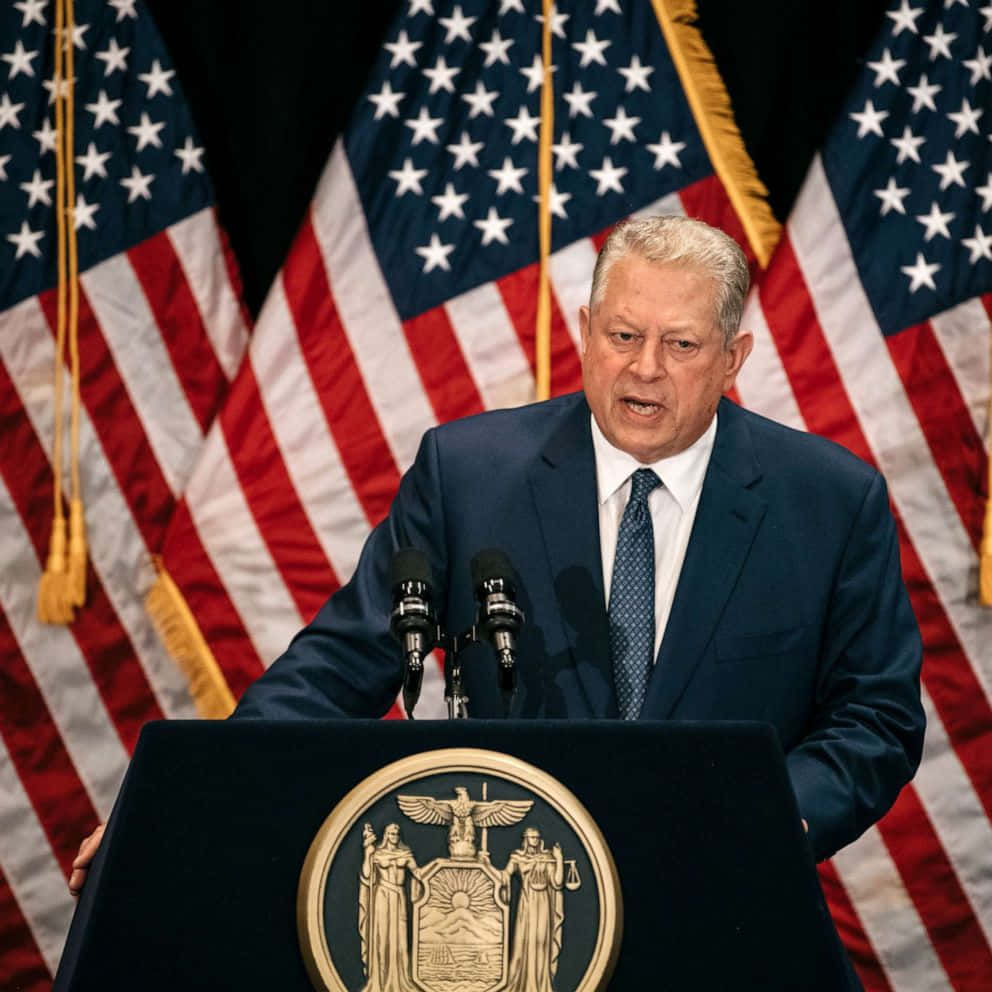 Al Gore, podium, American flags, SD Desktop Wallpaper