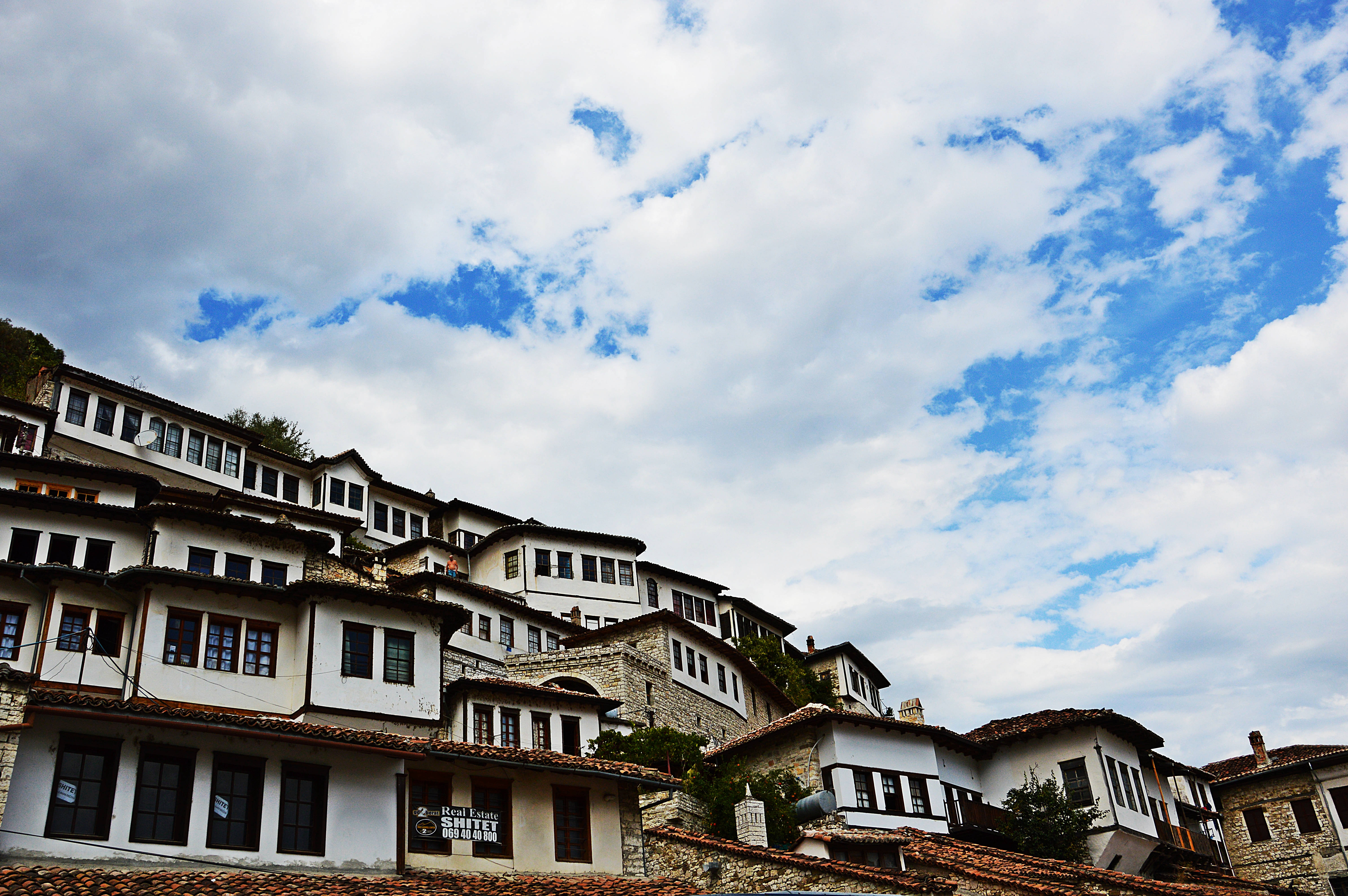 Albania, white-walled traditional houses, dark windows, 5K Desktop Wallpaper