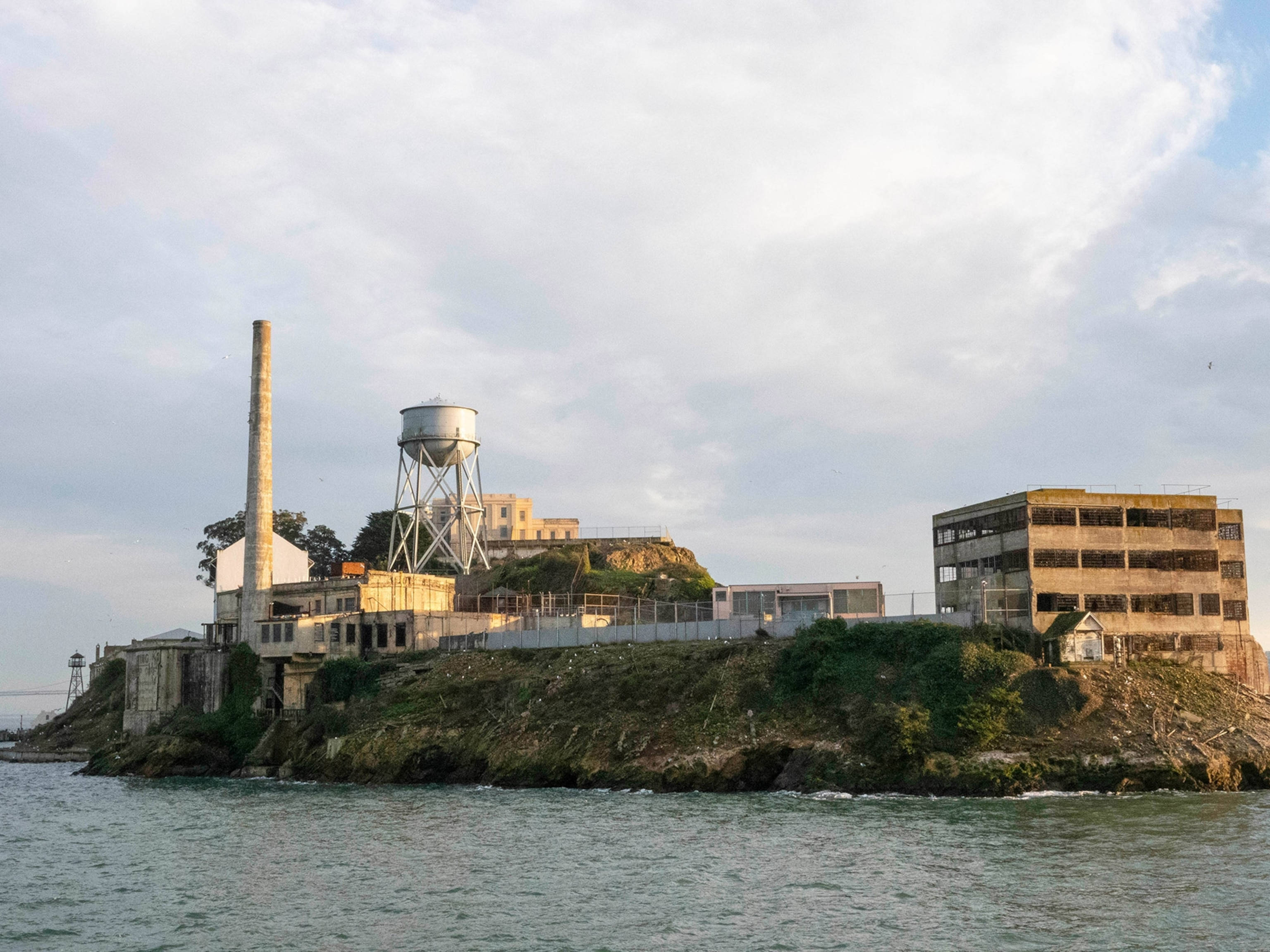 Alcatraz Island, historic prison buildings, cloudy sky, 2K Desktop Wallpaper