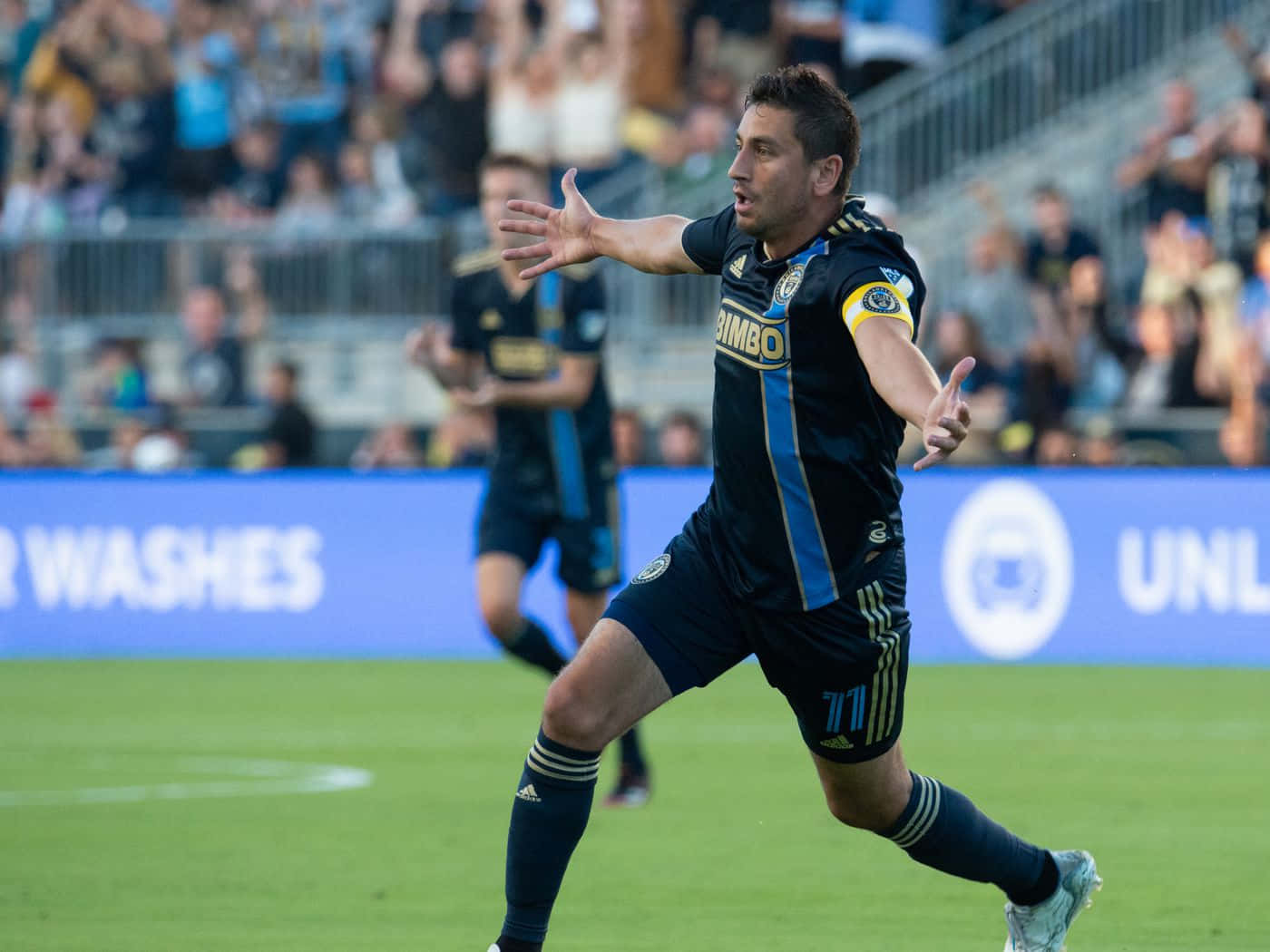 Alejandro Bedoya, black and blue uniform, vibrant green field, HD Desktop Wallpaper
