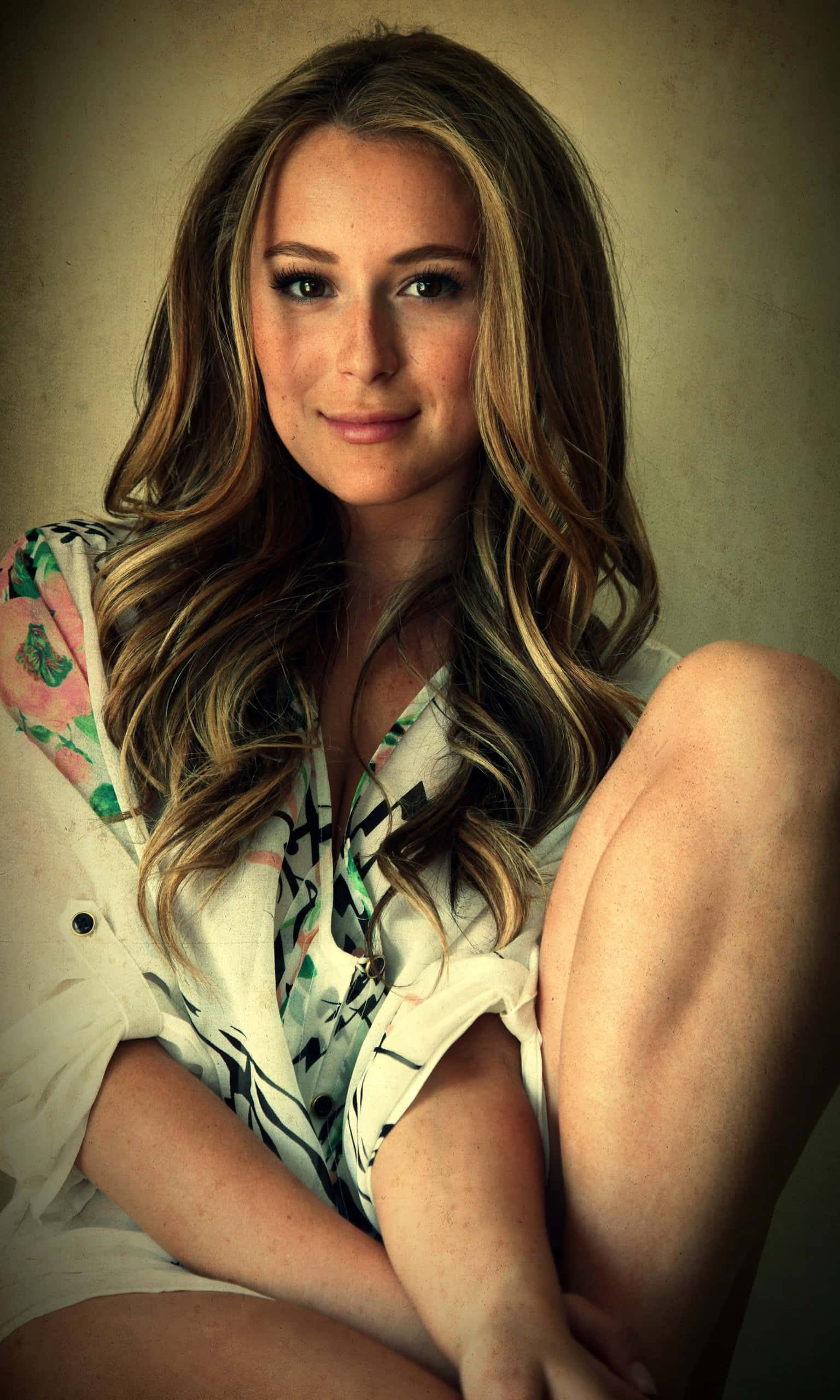 Alexa PenaVega, wavy blonde hair, textured beige wall, 2K Phone Wallpaper