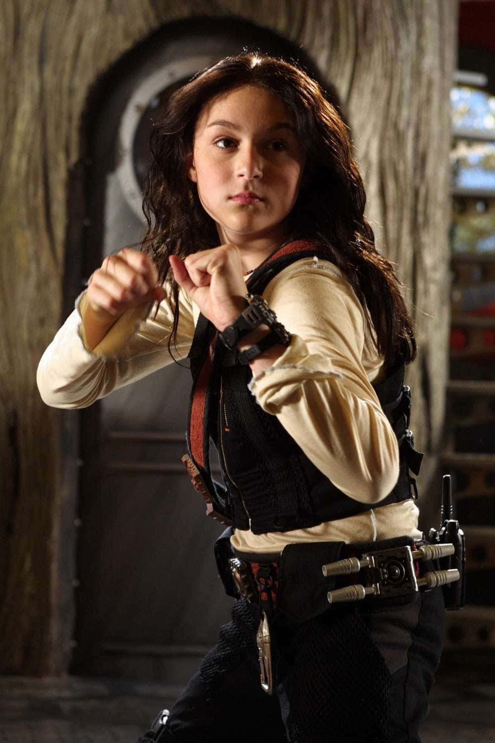 Alexa PenaVega, combat gear, dimly lit wooden corridor, HD Phone Wallpaper