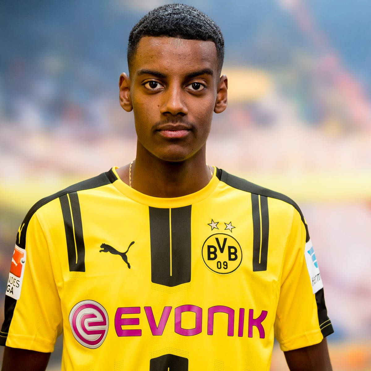 Alexander Isak, yellow Borussia Dortmund jersey, stadium backdrop, SD Desktop Wallpaper