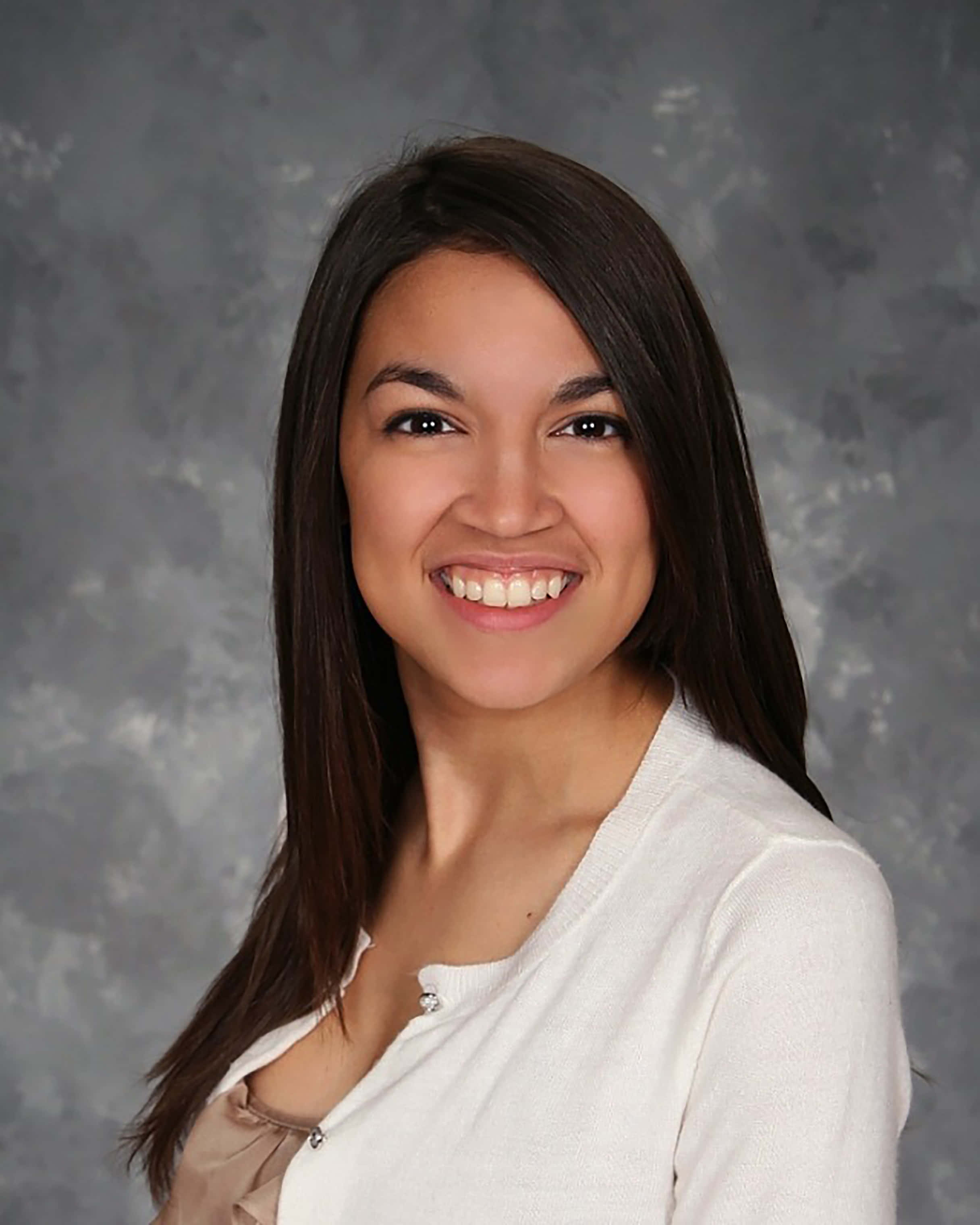 Alexandria Ocasio-cortez, smiling, long dark hair, 2K Phone Wallpaper
