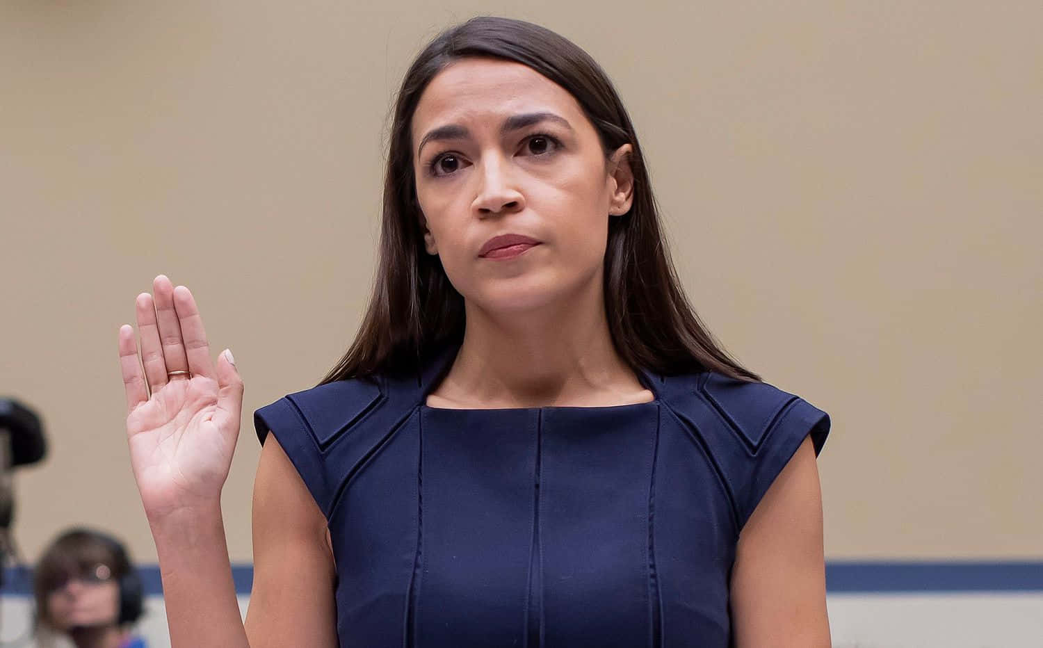 Alexandria Ocasio-cortez, navy blue dress, raising her right hand, HD Desktop Wallpaper