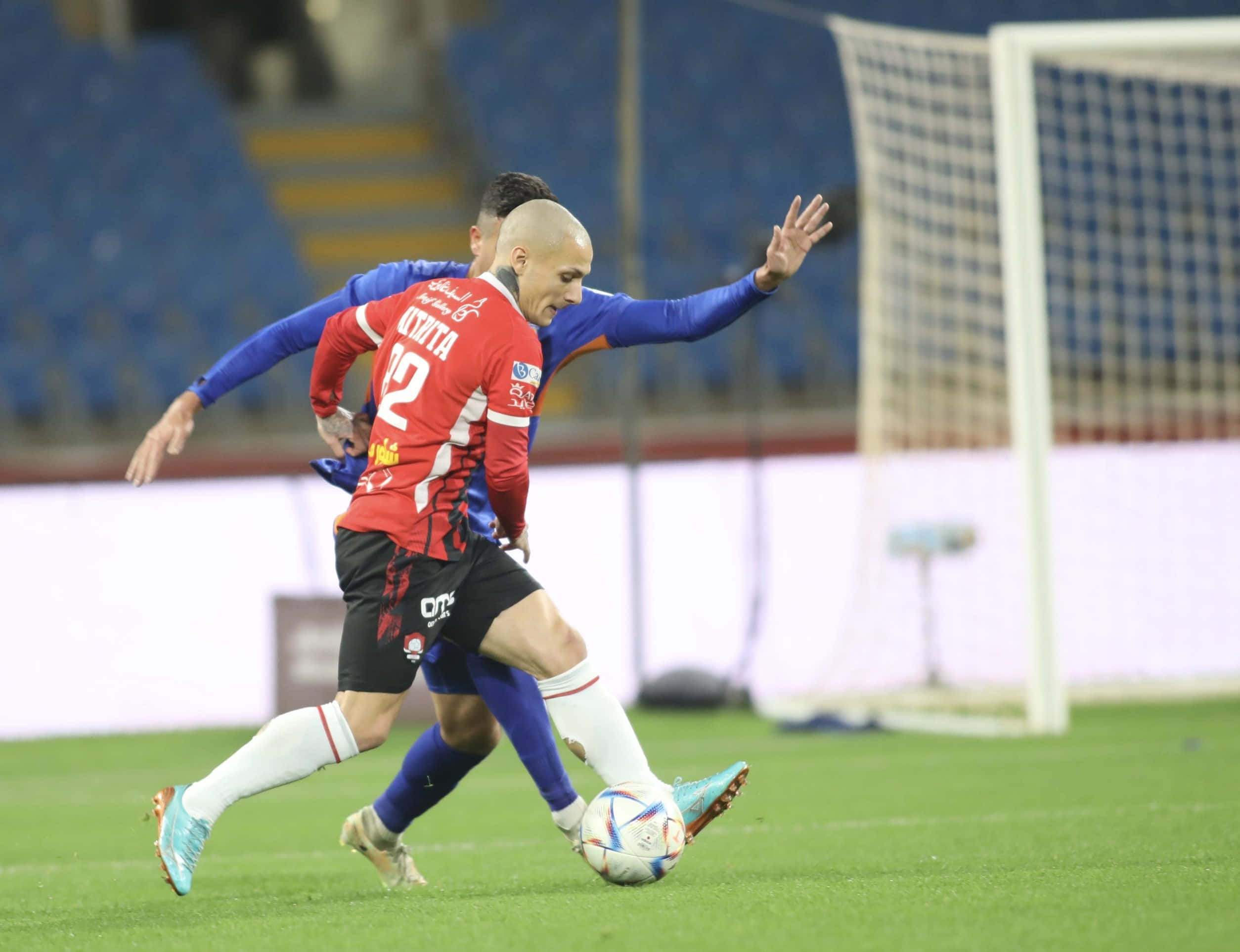 Alexandru Mitrita, red jersey number 12, defender in blue, Full HD Desktop Wallpaper