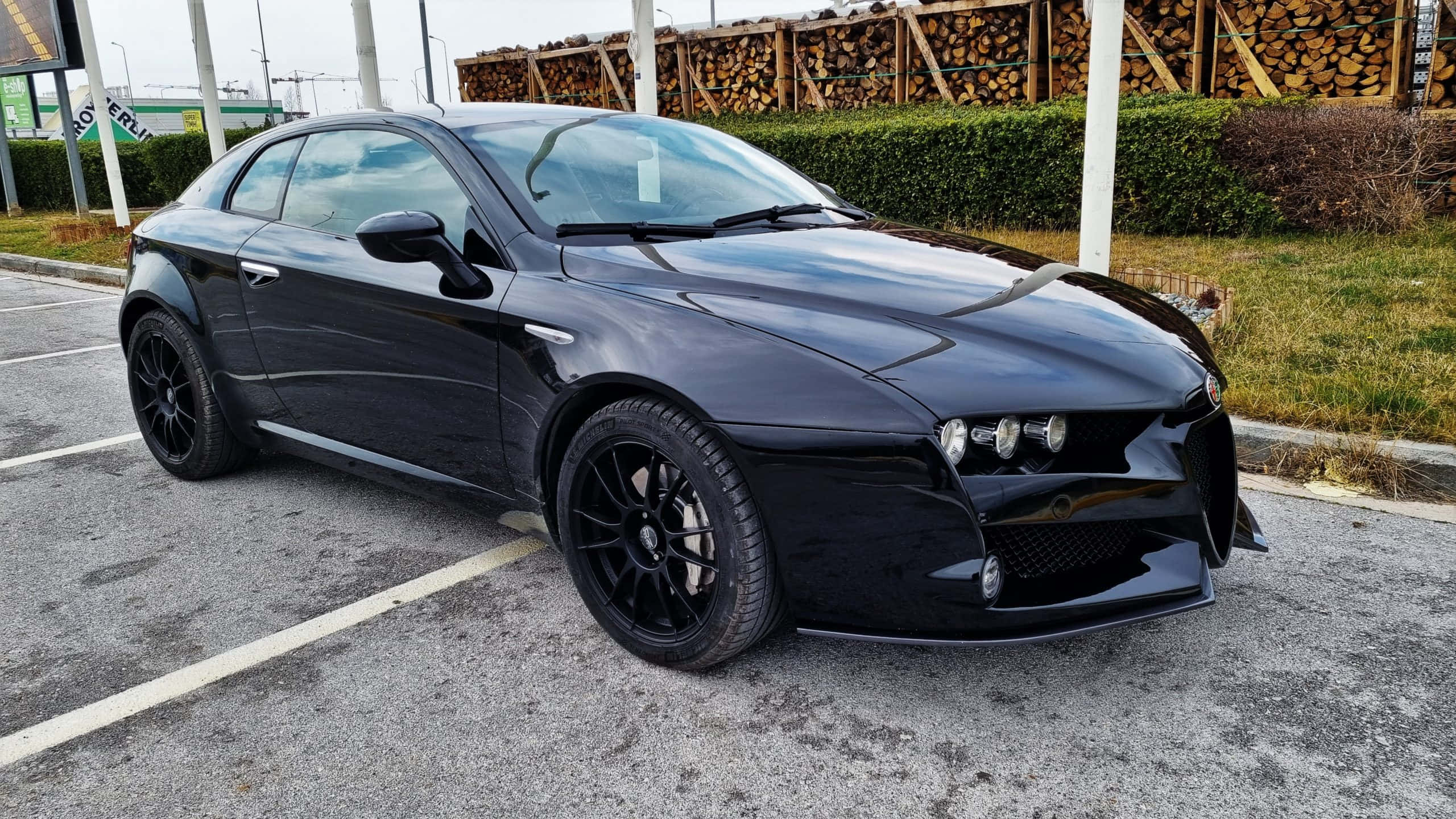 Alfa Romeo 159, sleek black, parked in a lot, 2K Desktop Wallpaper
