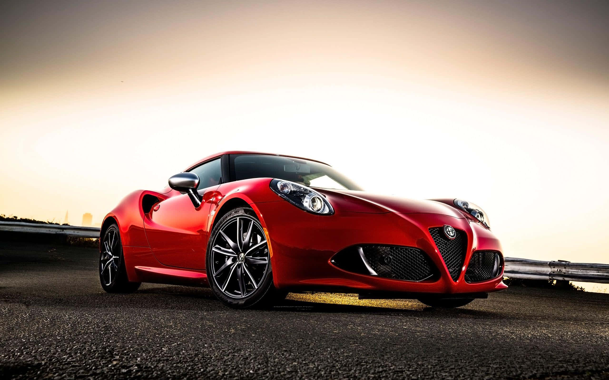 Alfa Romeo 4C, glossy red, golden sunset light, 2K Desktop Wallpaper