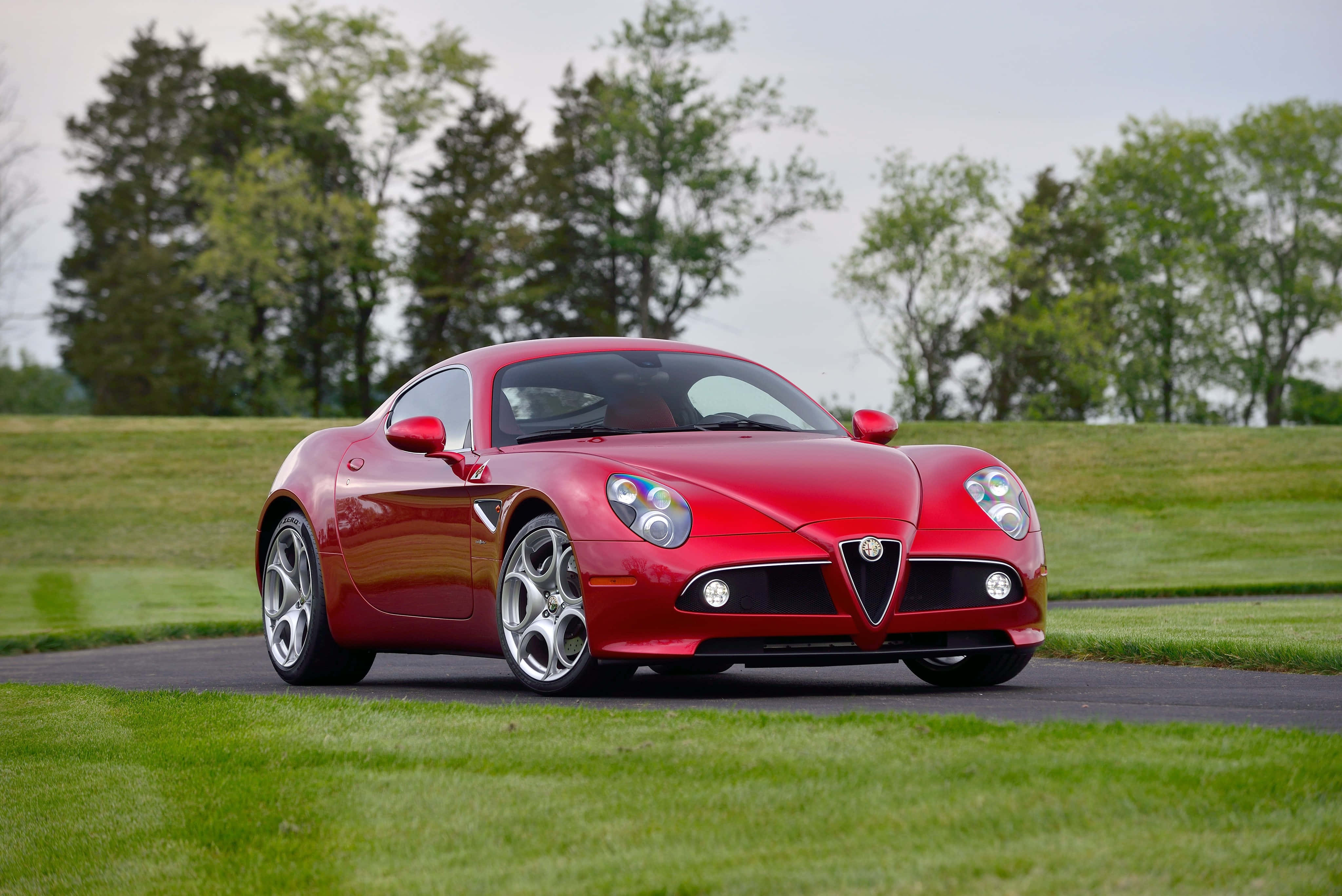 Alfa Romeo 8c Competizione, glossy red, paved road, 4K Desktop Wallpaper
