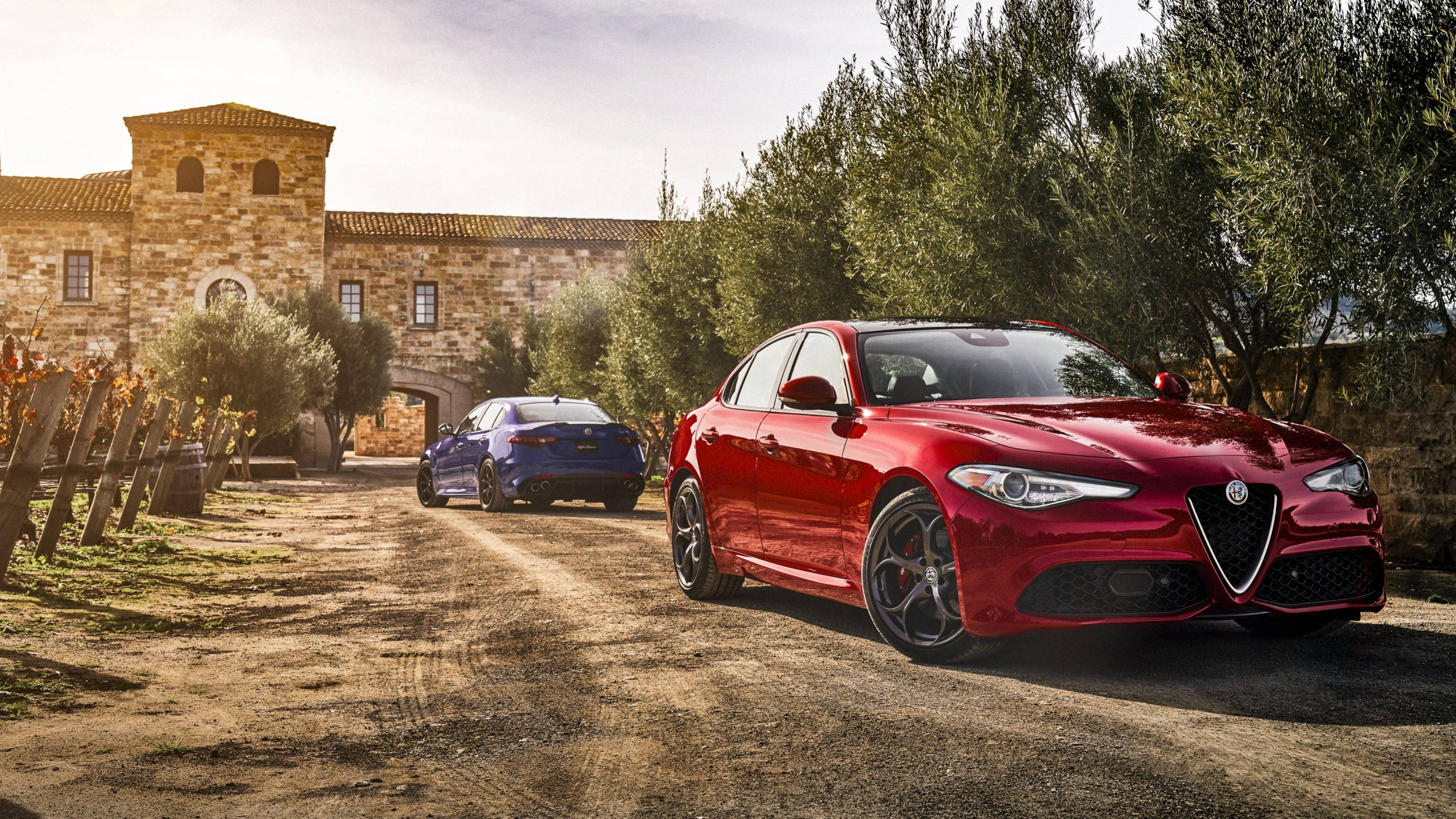 Alfa Romeo Giulia, vibrant red, deep blue, 4K Desktop Wallpaper