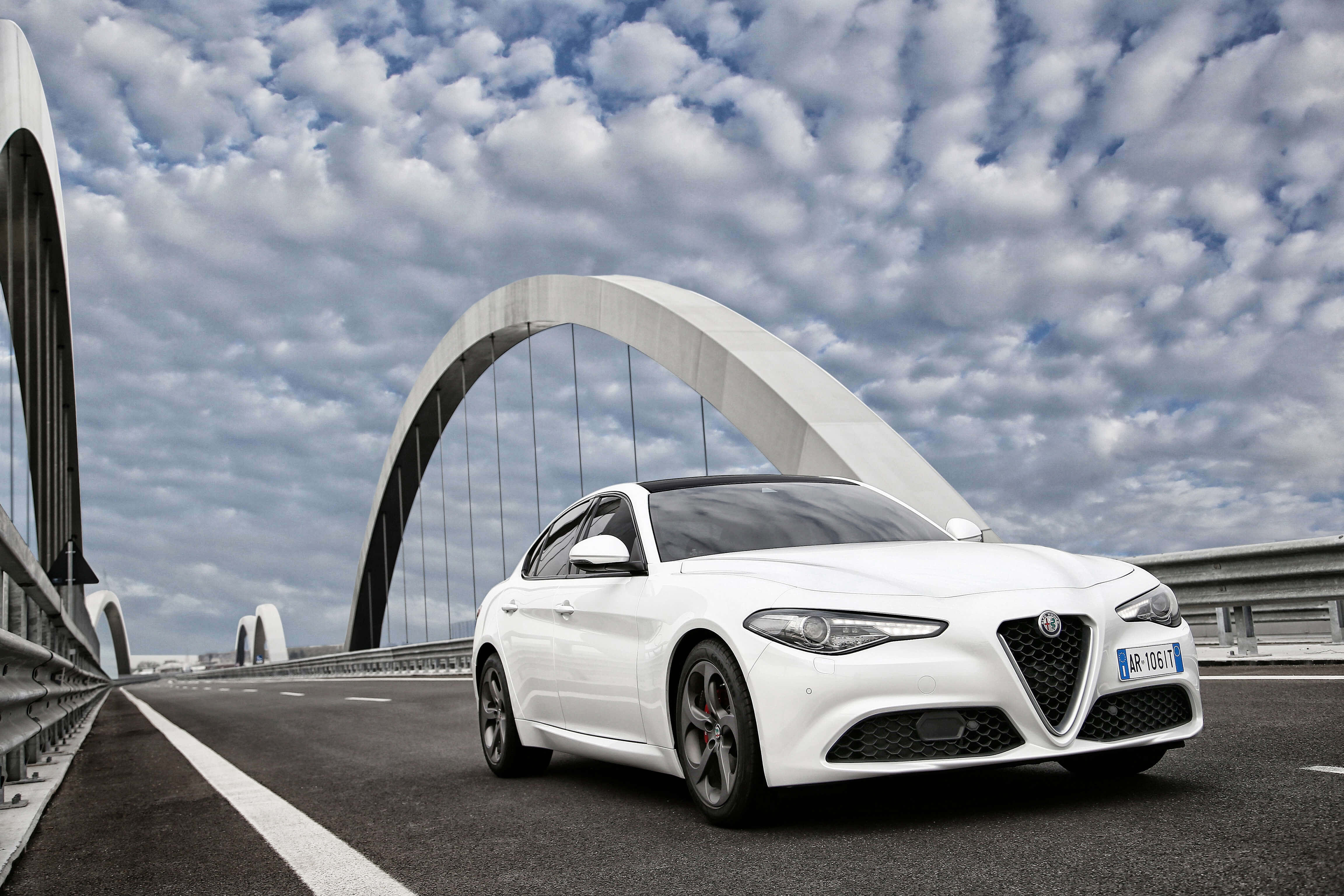 Alfa Romeo Giulia, white, modern arched bridge, 4K Desktop Wallpaper