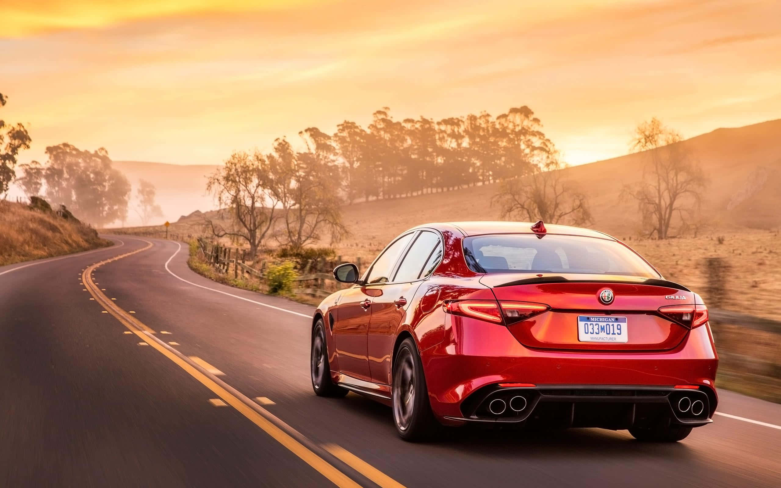 Alfa Romeo Giulia, red, winding rural road, 2K Desktop Wallpaper