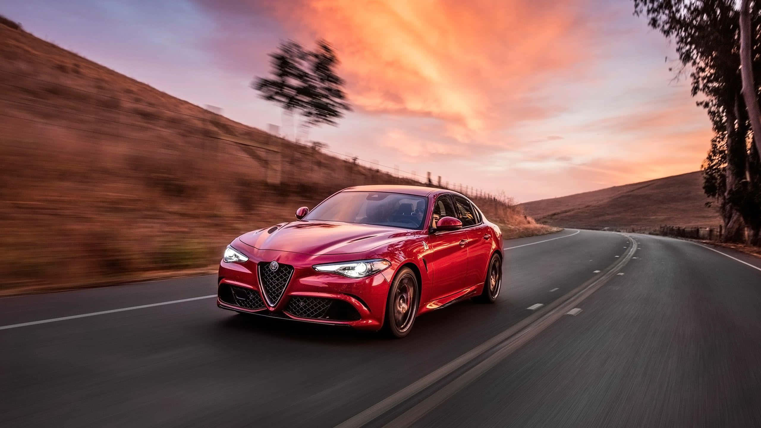Alfa Romeo Giulia, vibrant red, winding road, 2K Desktop Wallpaper